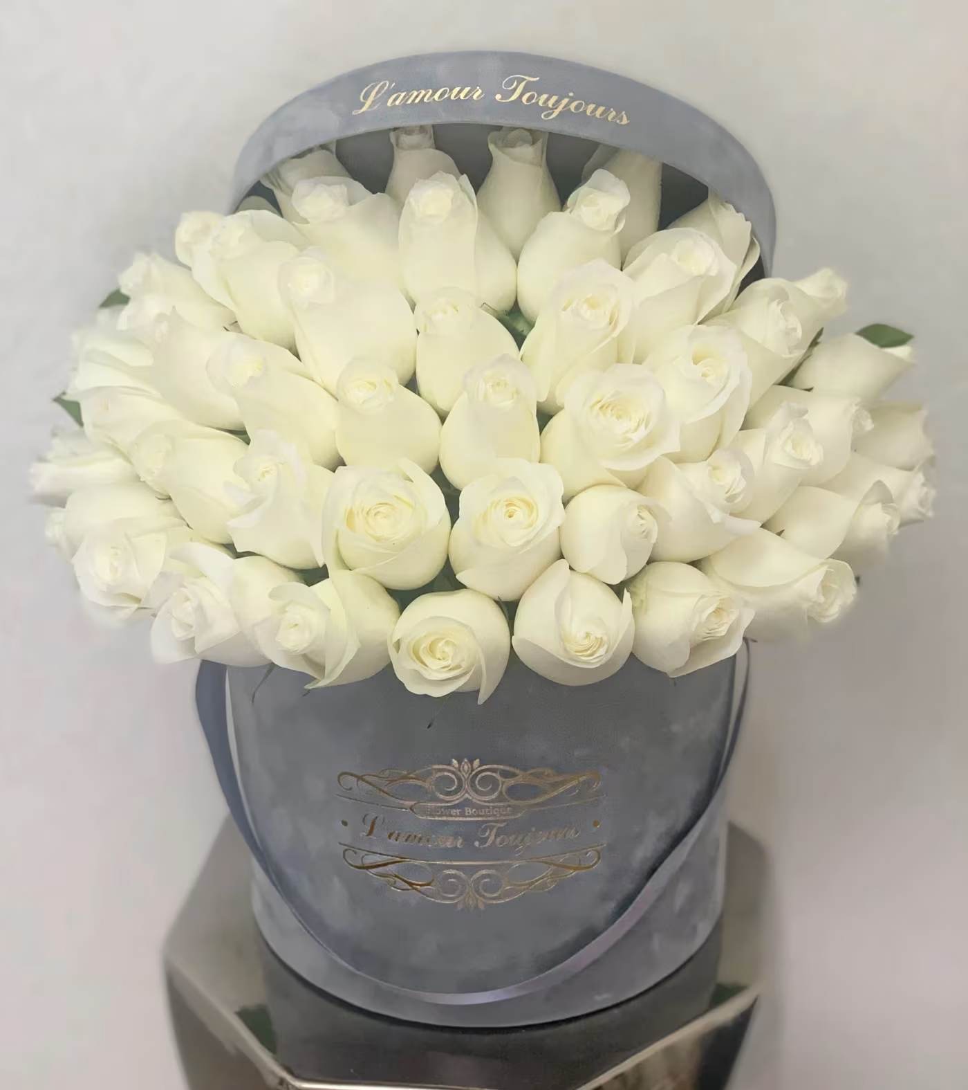 Gray's Velvet Signature Box - Discover premium flowers from L’amour Toujours Flower Boutique—luxury flowers designed to make every occasion unforgettable. Each arrangement features hand-selected blooms, beautifully arranged in our signature hatbox with a refined gold-foil monogram.  Perfect for birthdays, anniversaries, corporate gifting, or simply expressing love, our premium flower arrangements combine timeless elegance with modern sophistication.  As the ultimate luxury floral gift box, every detail is crafted to impress and delight. Elevate your gifting with fresh, hand-crafted flowers delivered in signature style—because every moment deserves to be remembered.