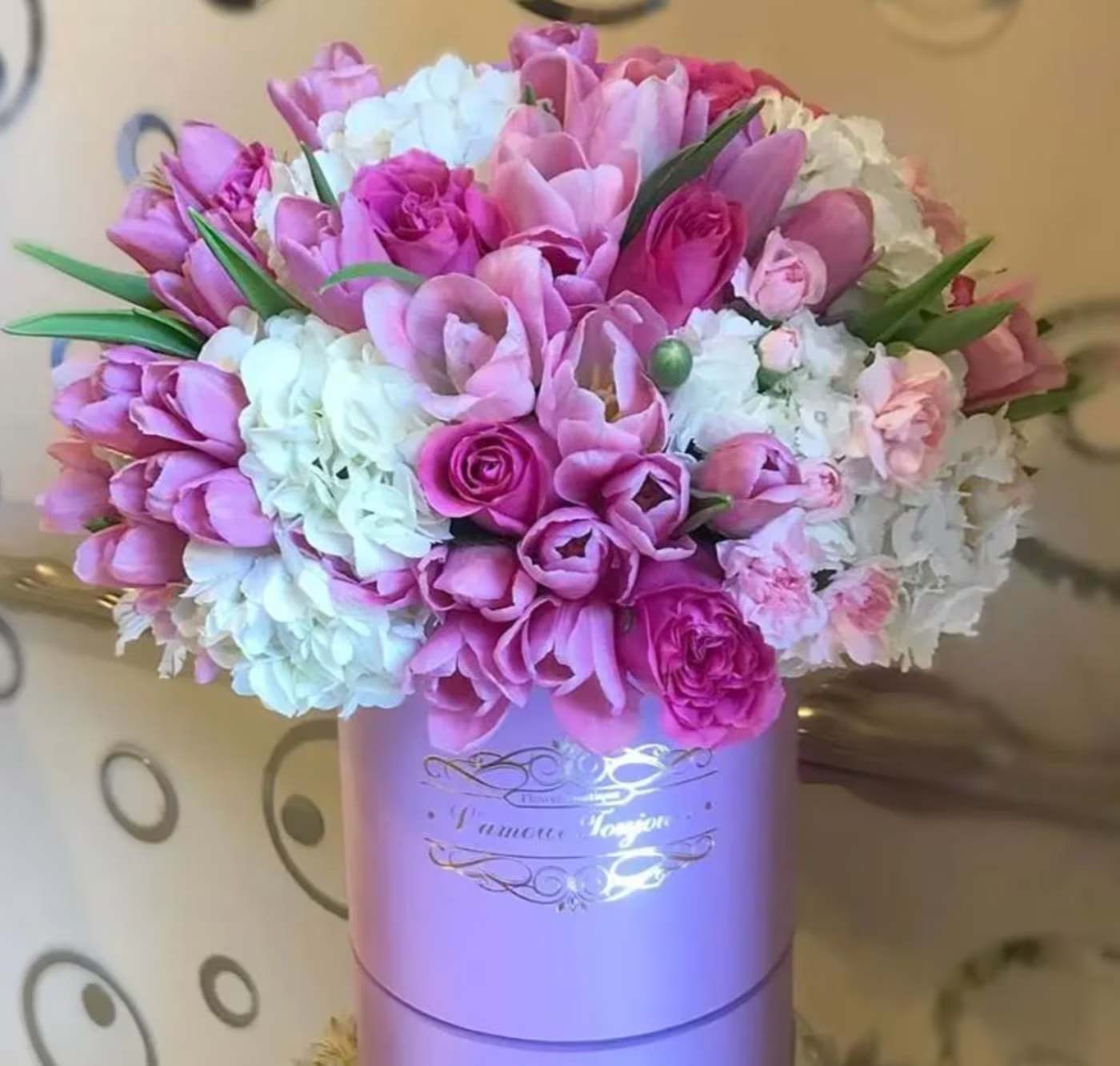 Tulips and Everything Nice Signature Box - Discover premium flowers from L’amour Toujours Flower Boutique—luxury flowers designed to make every occasion unforgettable. Each arrangement features hand-selected blooms, beautifully arranged in our signature hatbox with a refined gold-foil monogram.  Perfect for birthdays, anniversaries, corporate gifting, or simply expressing love, our premium flower arrangements combine timeless elegance with modern sophistication.  As the ultimate luxury floral gift box, every detail is crafted to impress and delight. Elevate your gifting with fresh, hand-crafted flowers delivered in signature style—because every moment deserves to be remembered.