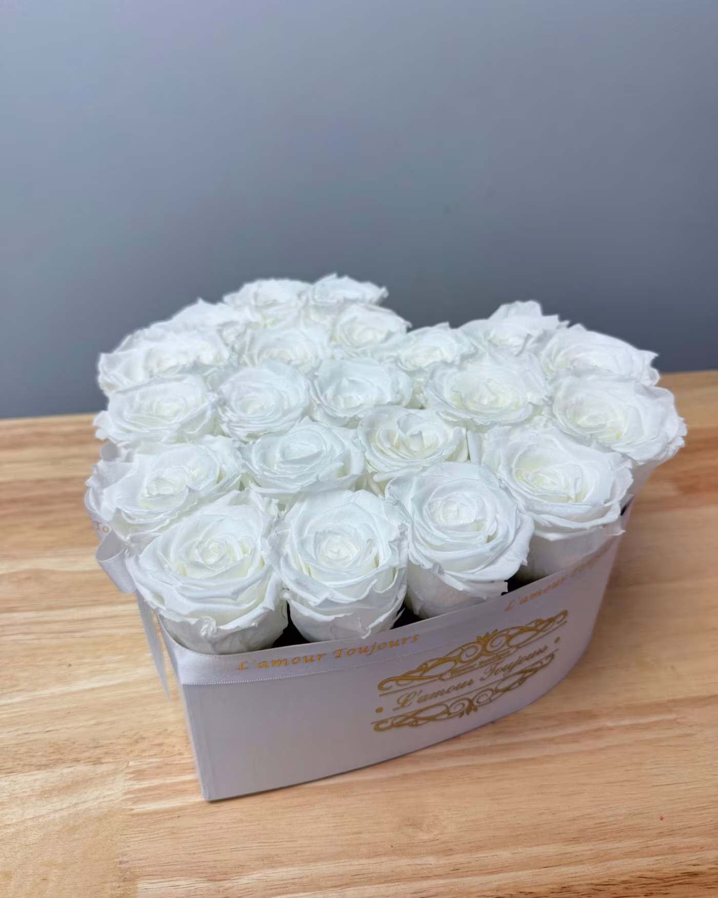 Everlasting Heart Signature Box - white on white - Premium Everlasting roses in our heart-shaped signature box. Everlasting roses are real roses that last over 3 years.
