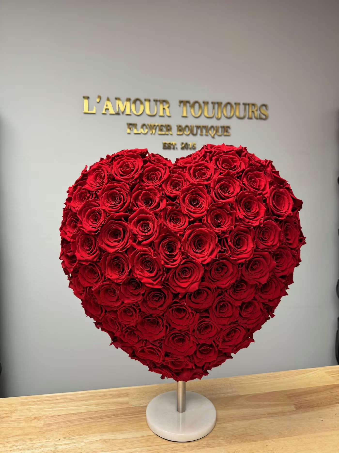 Everlasting Heart - Give her a unique gift of love! Our standing heart is made out of 100 Everlasting roses and comes with a marble stand.