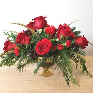 Red and Gold Centerpiece - Red roses, Red mini carnations, Christmas greens created in a decorative gold metal container.