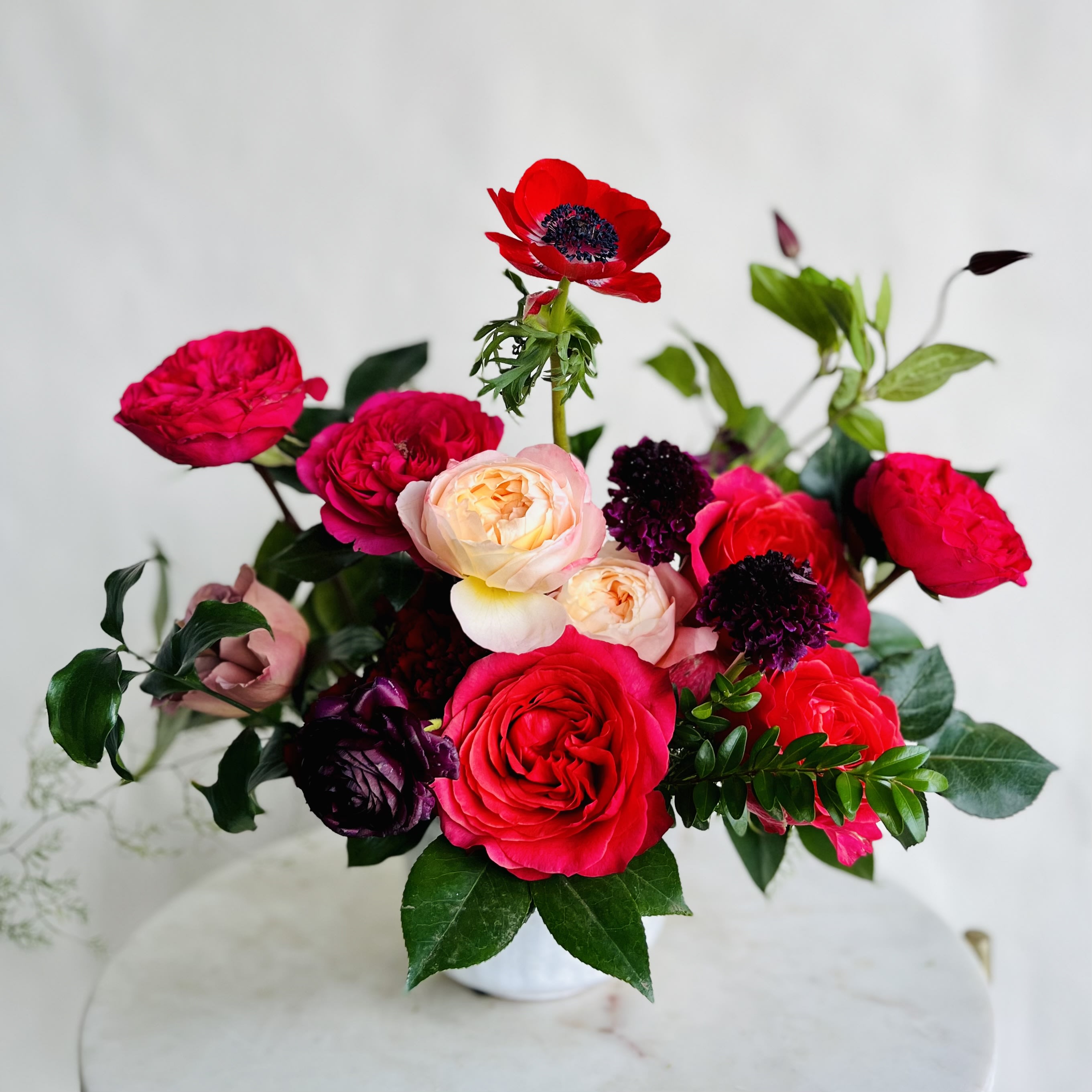 I Love You Berry Much - A vibrant, romantic arrangement full of pink, red, and burgundy blooms. A showstopper!