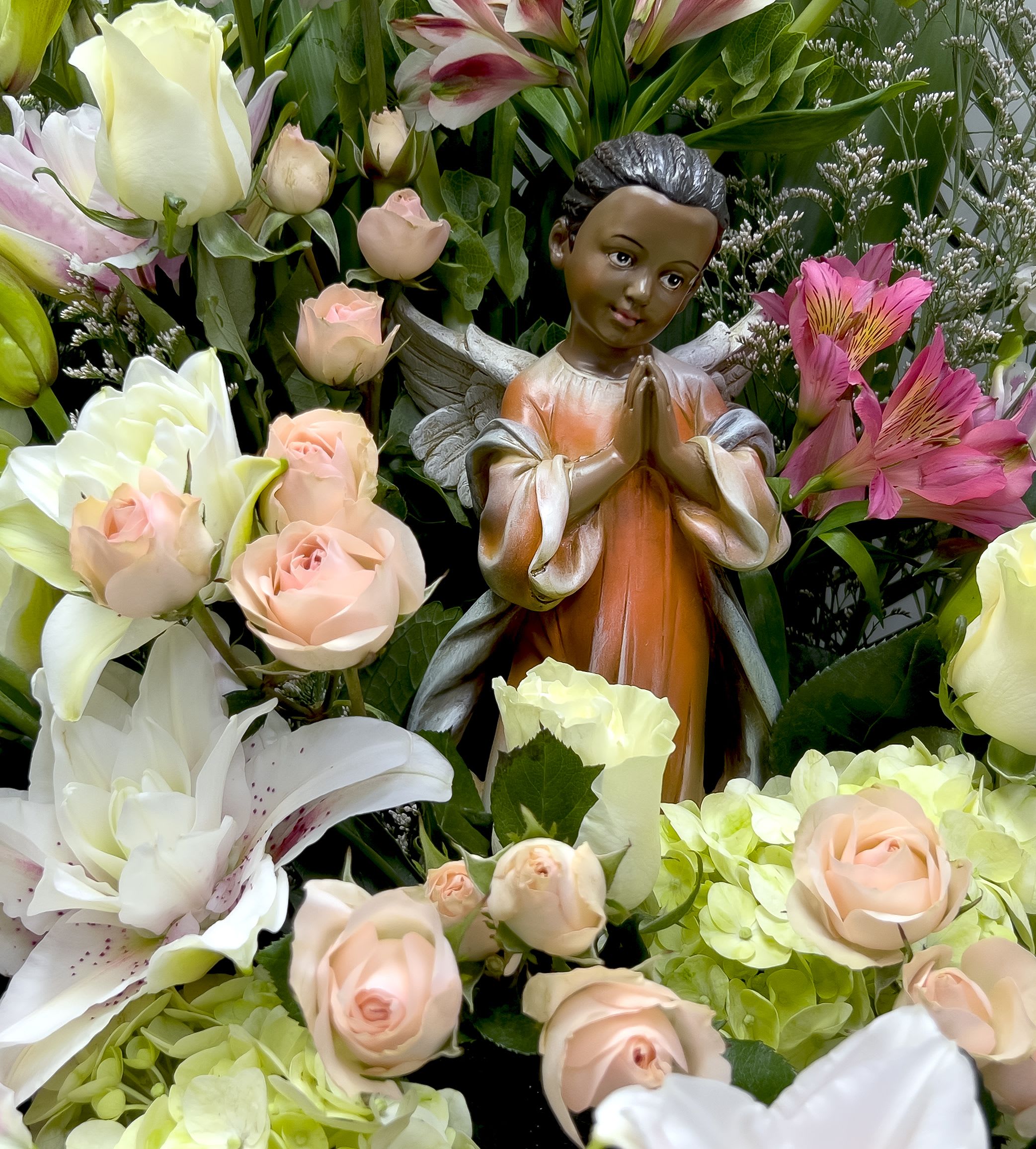 Blessed Angel Basket  - Premium Depicted. Choose the angel figurine that adorns this basket bouquet.