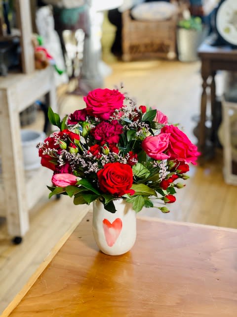 Love Me So Sweet Posie's Custom Bouquet - Love Me So Sweet bouquet features the brightest reds, pinks, and touches of dark purple. This wonderful vase has red and pink roses, pink tulips, dark purple carnations and more to warm that special someone's heart. This is a custom bouquet only created by the Posies by Patti designers for Valentine's Day!