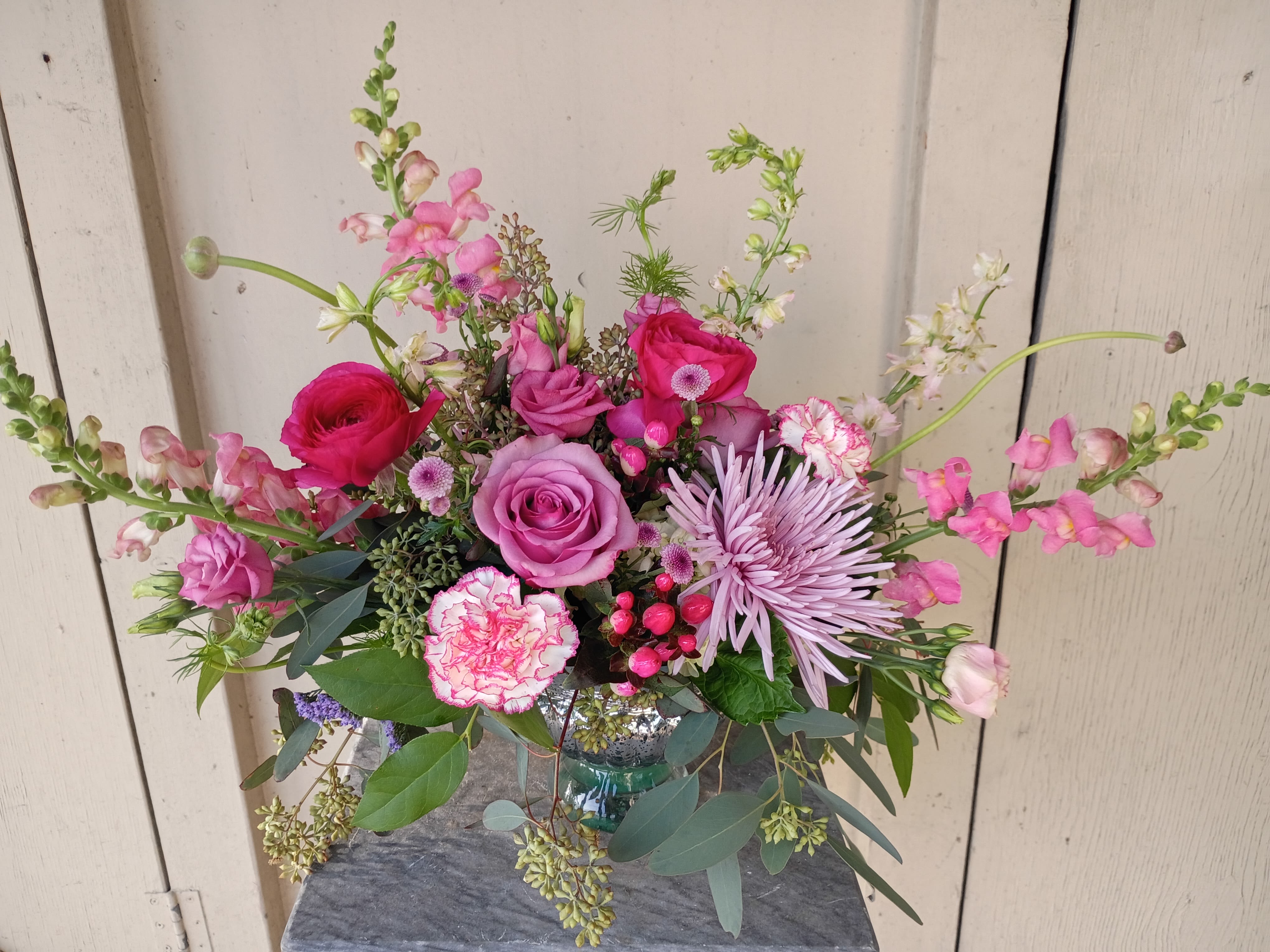 Wild Love - Wild Love is a free-spirited floral arrangement that celebrates romance in its most natural form. Layered with whimsical movement and organic texture, it blends soft, romantic blooms with untamed greenery for a look that feels effortlessly gathered and deeply heartfelt. Airy, textural elements dance alongside lush petals, creating a design that’s both playful and passionate—perfect for love stories that are bold, natural, and beautifully unrestrained.