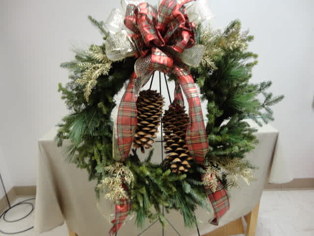 Christmas Fresh Wreath - Fresh wreath with pine cones and decor.