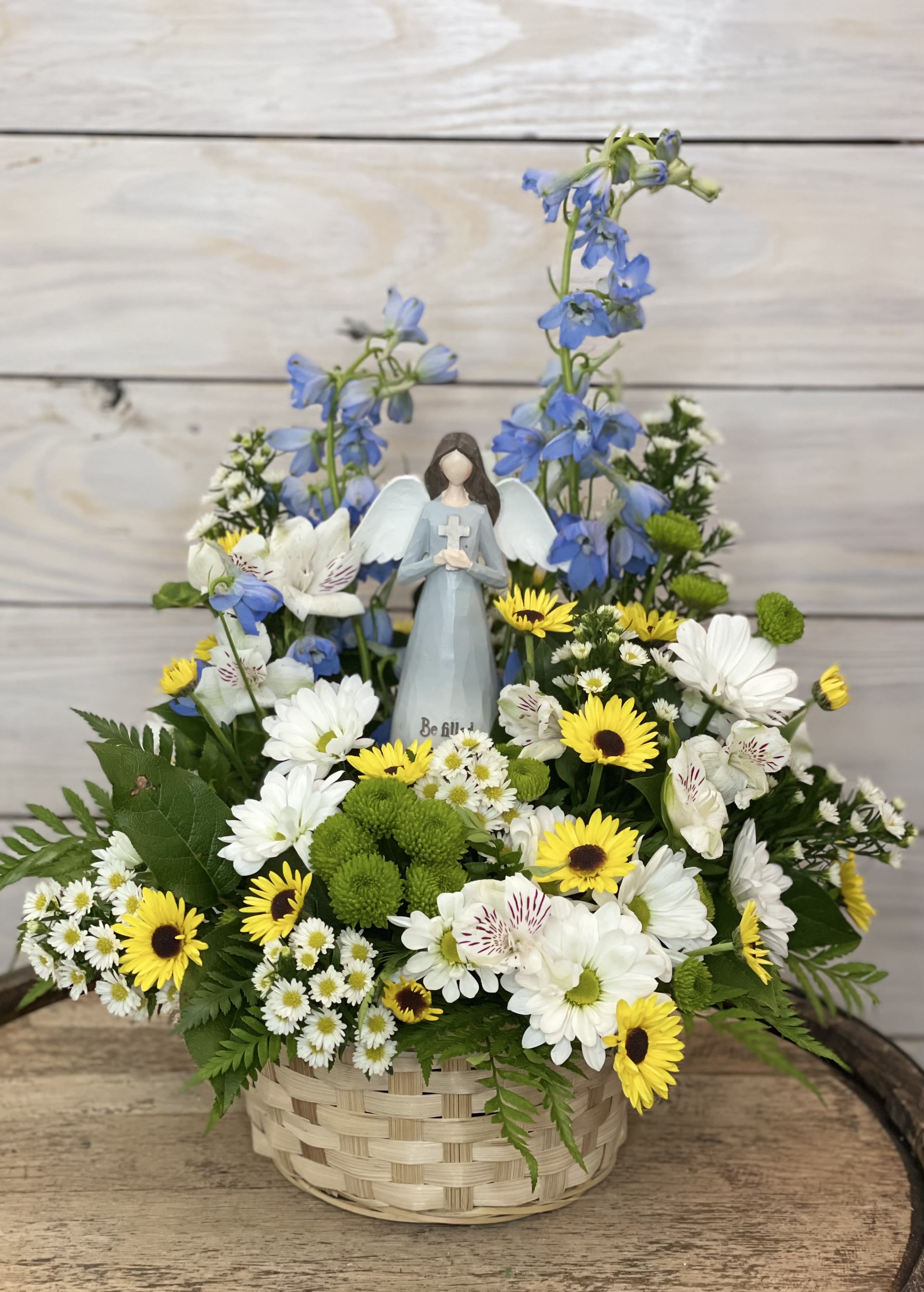 Sweet Garden Memories - Like our OG "Garden Angel", this arrangement also comes with an Angel figurine at the center of the basket. This time we used lighter and brighter tones for those cherished memories of spring and summer. ***We will do our best to match the picture with what is available at the store at the time. We will substitute as needed, but will keep the same look and feel of the arrangement pictured.****