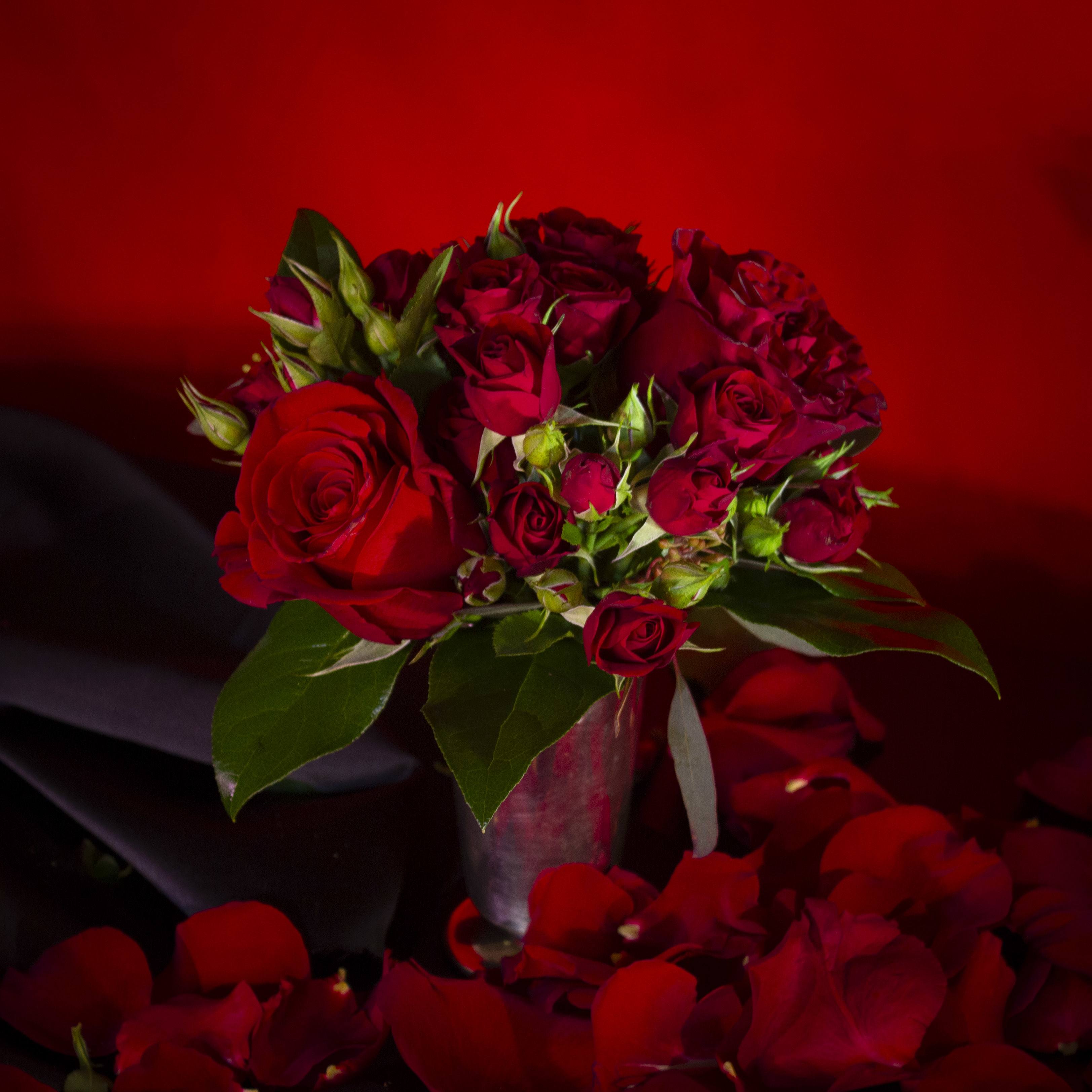 'My Valentine's' by Madison's Flowers - Adorable, romantic, and petite tussy mussy of Sexy Red Roses, and petite scarlet spray roses in a fluted silver vase.  A traditional  and elegant way of sharing love on Valentine's Day with the Valentine in your life. Sometimes simple is the sweetest sentiment.  A Madison's Flowers original design. Vase is approx. 2.5"x6. Vase may varies slightly.