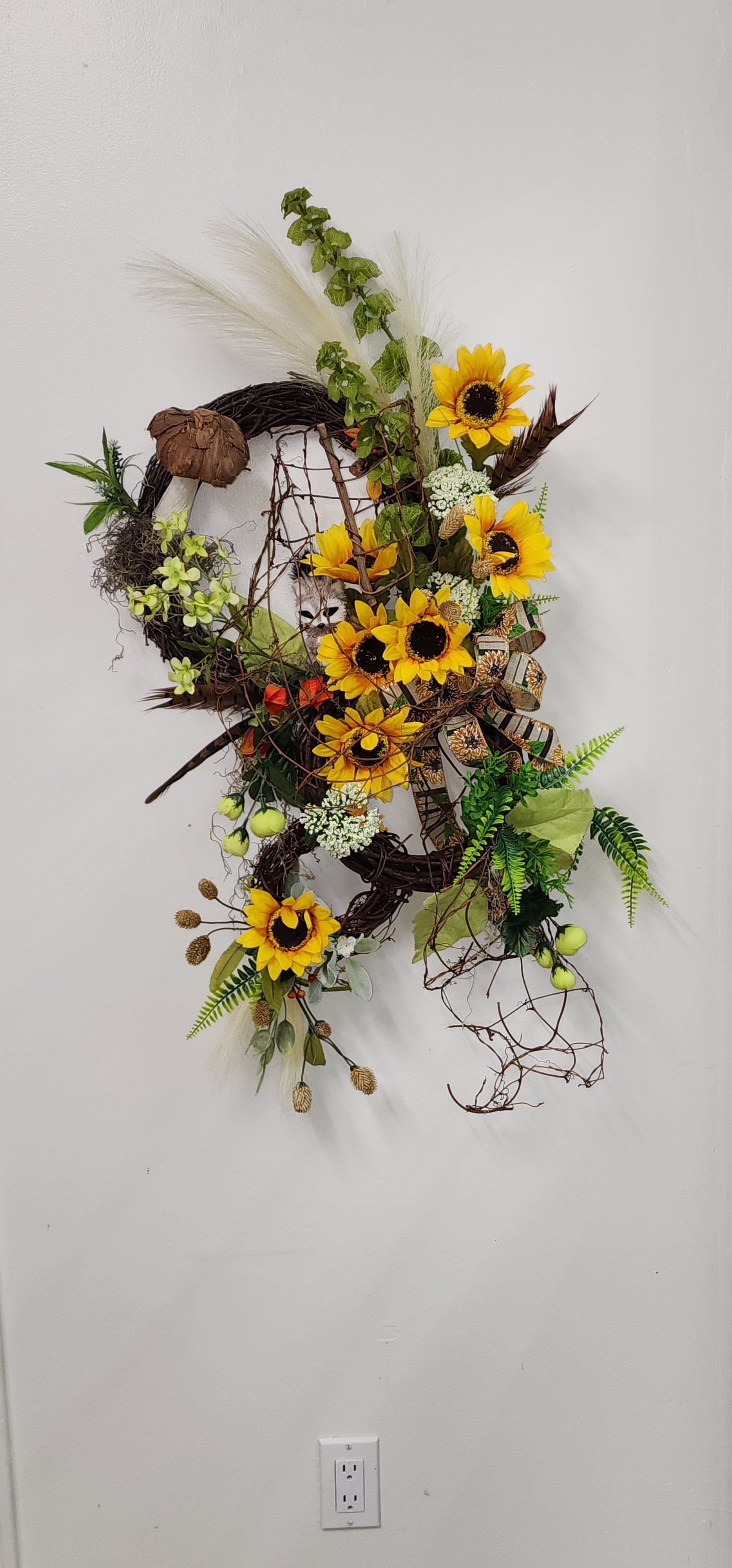 Sunflower melody wreath - Woodland inspired modern wreath of sunflowers with a mischievous racoon and woodland mushroom for whimsy. 