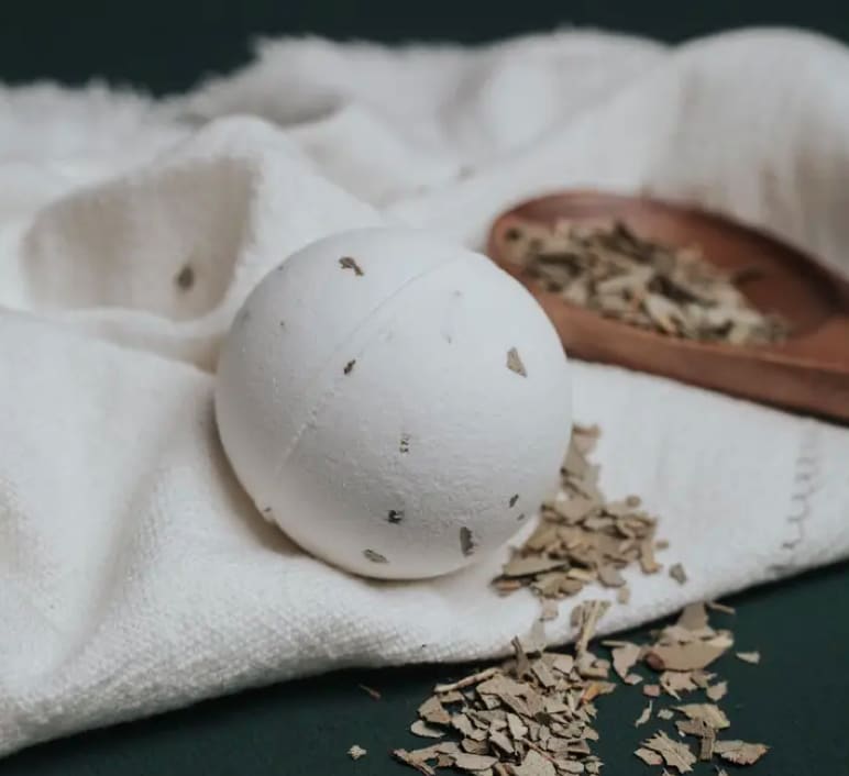Eucalyptus Bath Bomb  - Fresh from the garden, this eucalyptus bath bomb will bring medicinal aroma to your bathtub. Detox with the therapeutic properties found in eucalyptus.  Each bath bomb is hand wrapped with white tissue paper and sealed with a round sticker with custom watercolor image corresponding to each scent.  4.25 oz each  Ingredients: sodium bicarbonate, citric acid, grapeseed oil, purified water, essential oil, crushed eucalyptus leaves  Made in United States