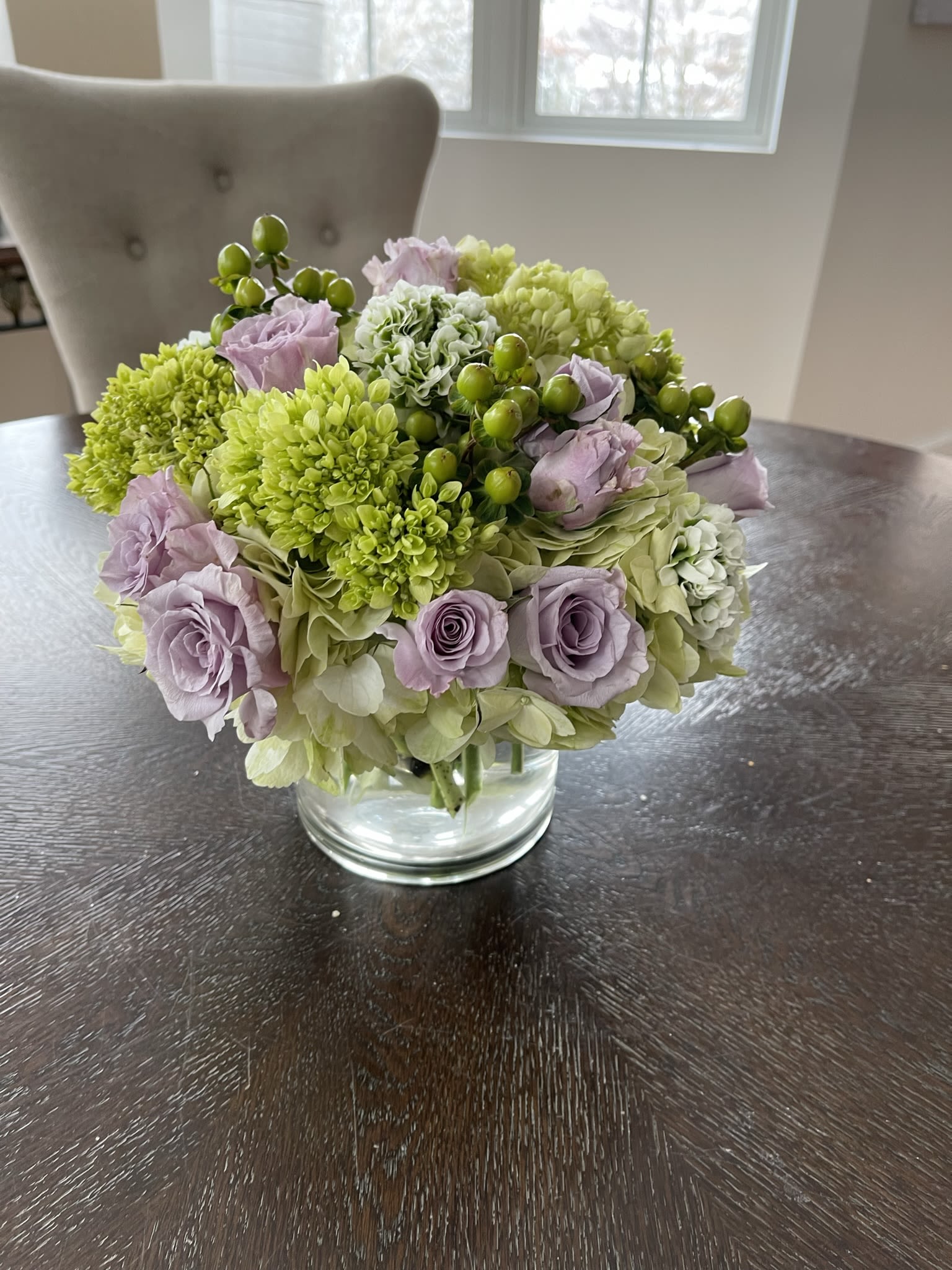 Elegance of Southampton's Estate Section - Elegance of Southampton's Estate Section is simplistic for any occasion.    We customize each arrangement with the highest flower quality geared towards any special moment.   This floral design is arranged in a low glass vase for that customer looking for a soft color palette of white and blush consisting of roses, hydrangeas and orchids. 