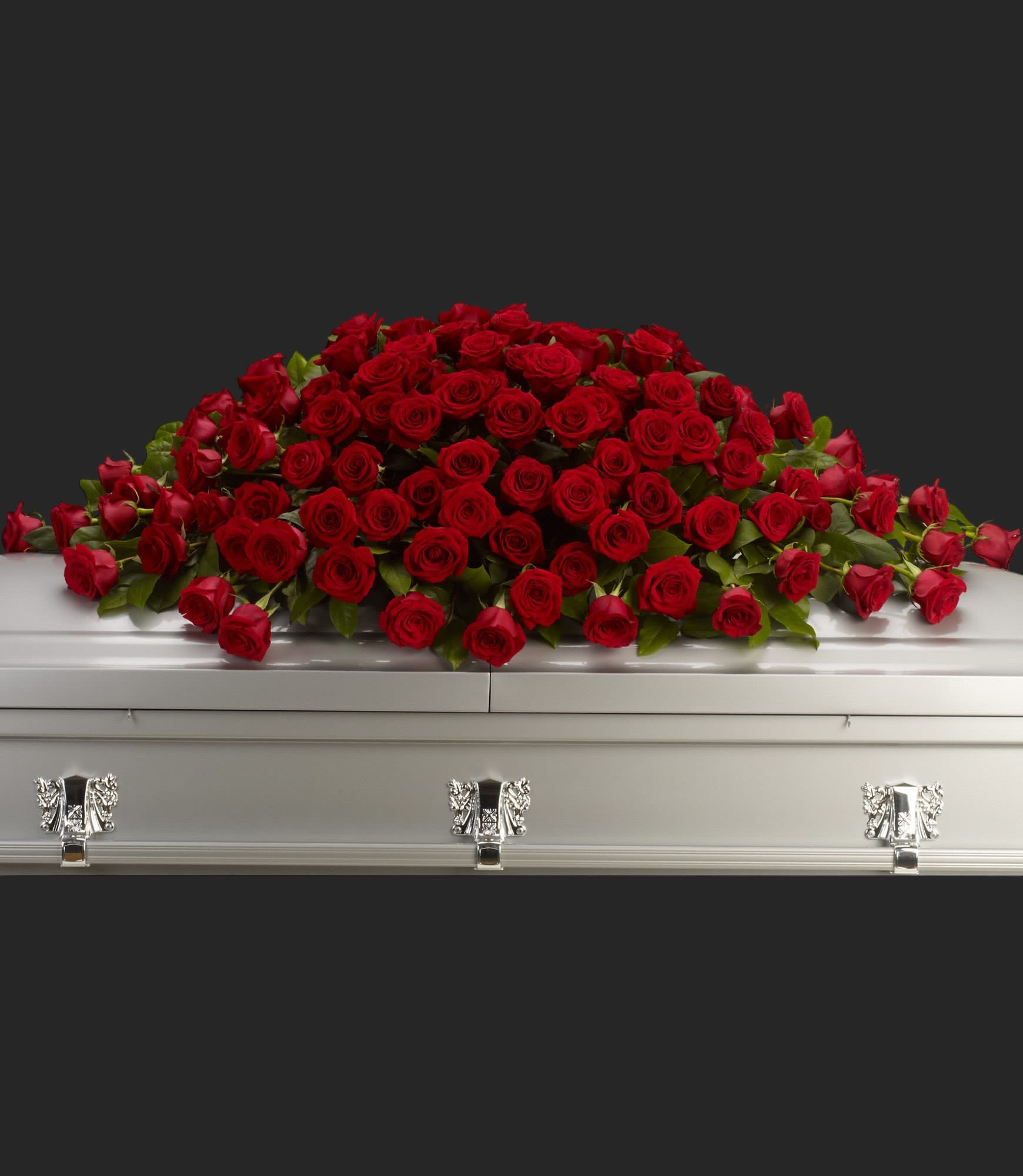 Greatest Love Casket Spray - A loving embrace of rich, regal roses in an all-red spray to adorn the casket.  