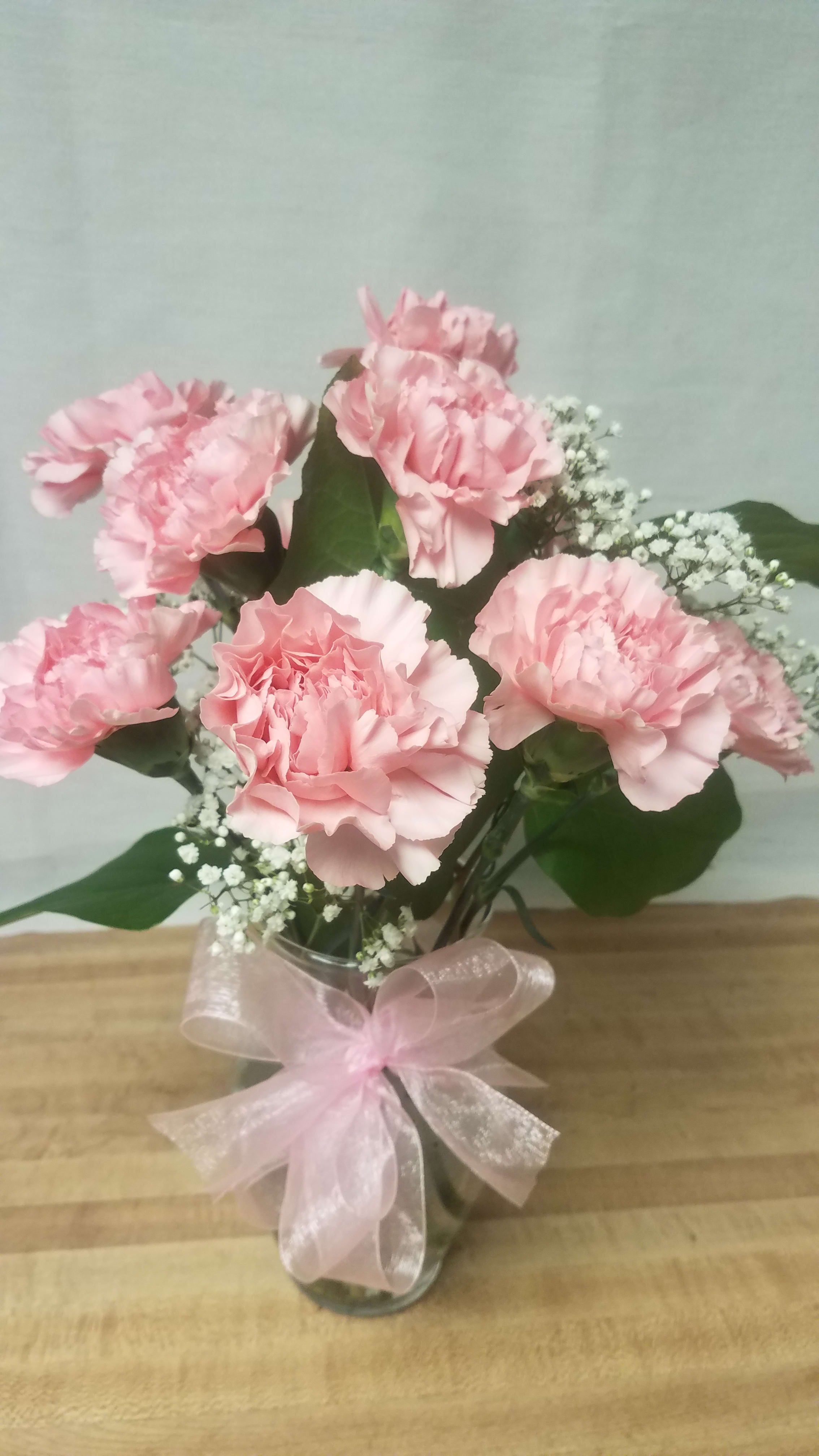 ON  MY  MIND - Pure, long lasting enjoyment in a simple glass vase of carnations and mixed foliages. The perfect little treasure to show someone you care. 