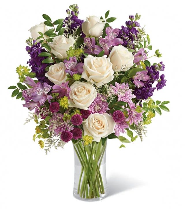Lavender Joy - This lushful bouquet full of purple florals will delight your loved one for days. Perfect gift to celebrate Mother's Day, a birthday or just because. Hand-delivered by a local florist in a cylinder vase.