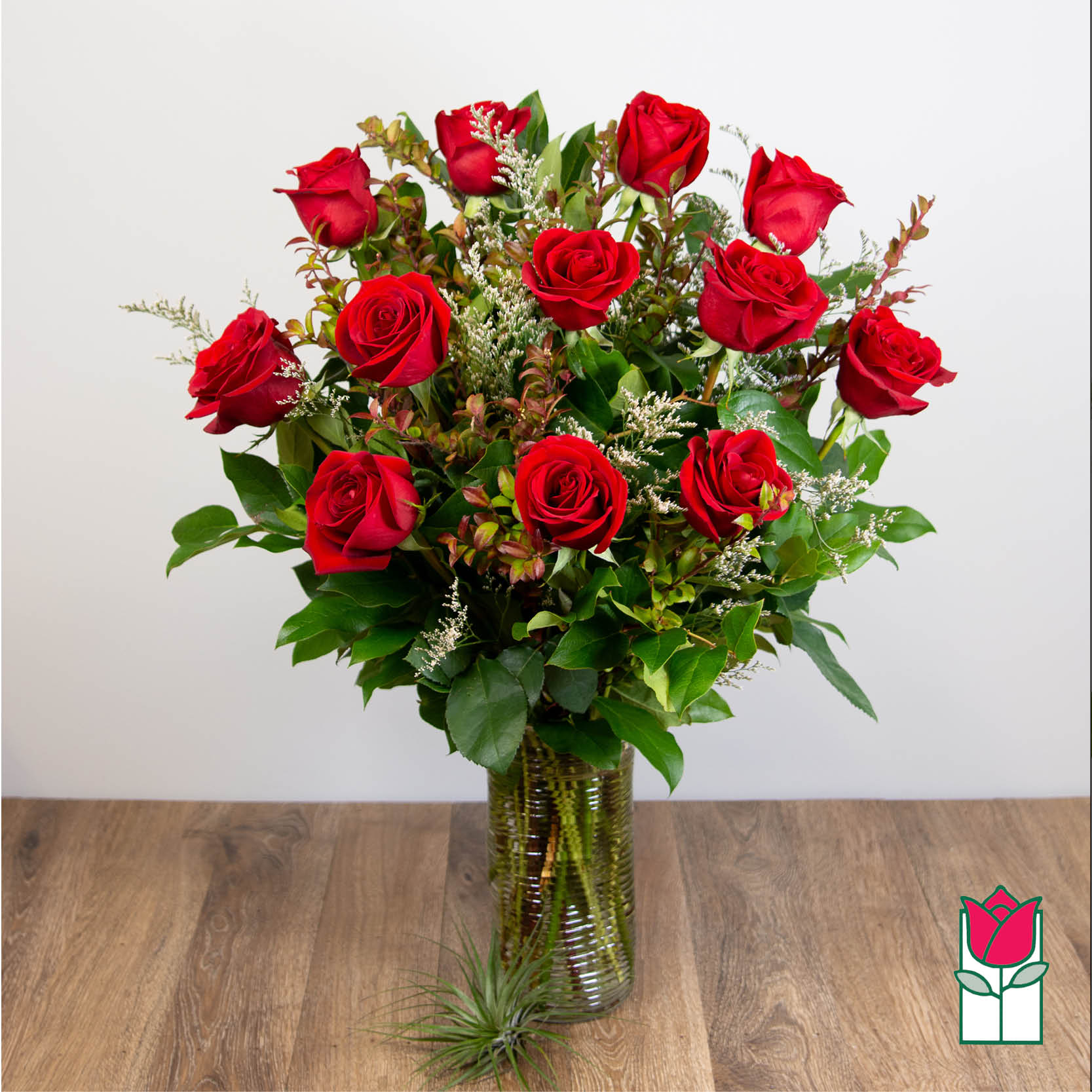 [Non-Valentines] Beretania's Extra Long Stem Red Rose Masterpiece (30% Larger Flowers) - 1 Dozen Premium Extra Long Stem Red Roses   Indulge in the timeless elegance of the Beretania Florist Premium Extra Long Stem Roses bouquet. Our exquisite bouquet features premium Ecuadorian extra-fancy roses, which are 30% larger than any other rose in the islands. Available in a classic glass vase with assorted foliage and filler flowers, this bouquet is the perfect gift for any occasion.  But our exceptional product is only half the story. At Beretania Florist, we pride ourselves on our professional and convenient delivery service. We carefully hand-deliver each bouquet to ensure it arrives at its destination in pristine condition. Our team is dedicated to providing the highest level of customer service, and we strive to exceed your expectations with every order.  And for added convenience, we offer the option to choose or upgrade the number of roses in your bouquet. Whether you prefer a classic one dozen, a stunning one and a half dozen, a grand two dozen, or an opulent three dozen, we have the perfect bouquet for you.  Trust Beretania Florist to deliver the highest quality roses and the best service in the Honolulu area.