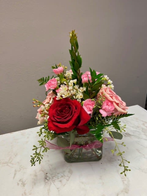 #7 Valentine arrangement  - The cutest little cube vase with the prettiest flowers! Roses and mini carnations will make anyone's day!