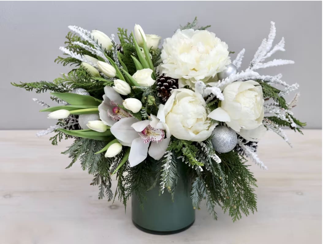 Snowy Peony - WeHo - Just in time for the holiday season, this beautiful arrangement of peonies, tulips, and fragrant fir makes for a wonderful gift. 