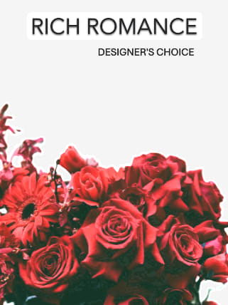 Rich Romance - Designer Choice - Our designers will create a beautiful arrangement with the most magnificent blooms mother nature has to offer. While we cannot guarantee a specific flower type, we can promise that your arrangement will be stunning, fresh and one of a kind!  Flowers and containers may not reflect exactly as pictured but will stay within the color palette you have requested.