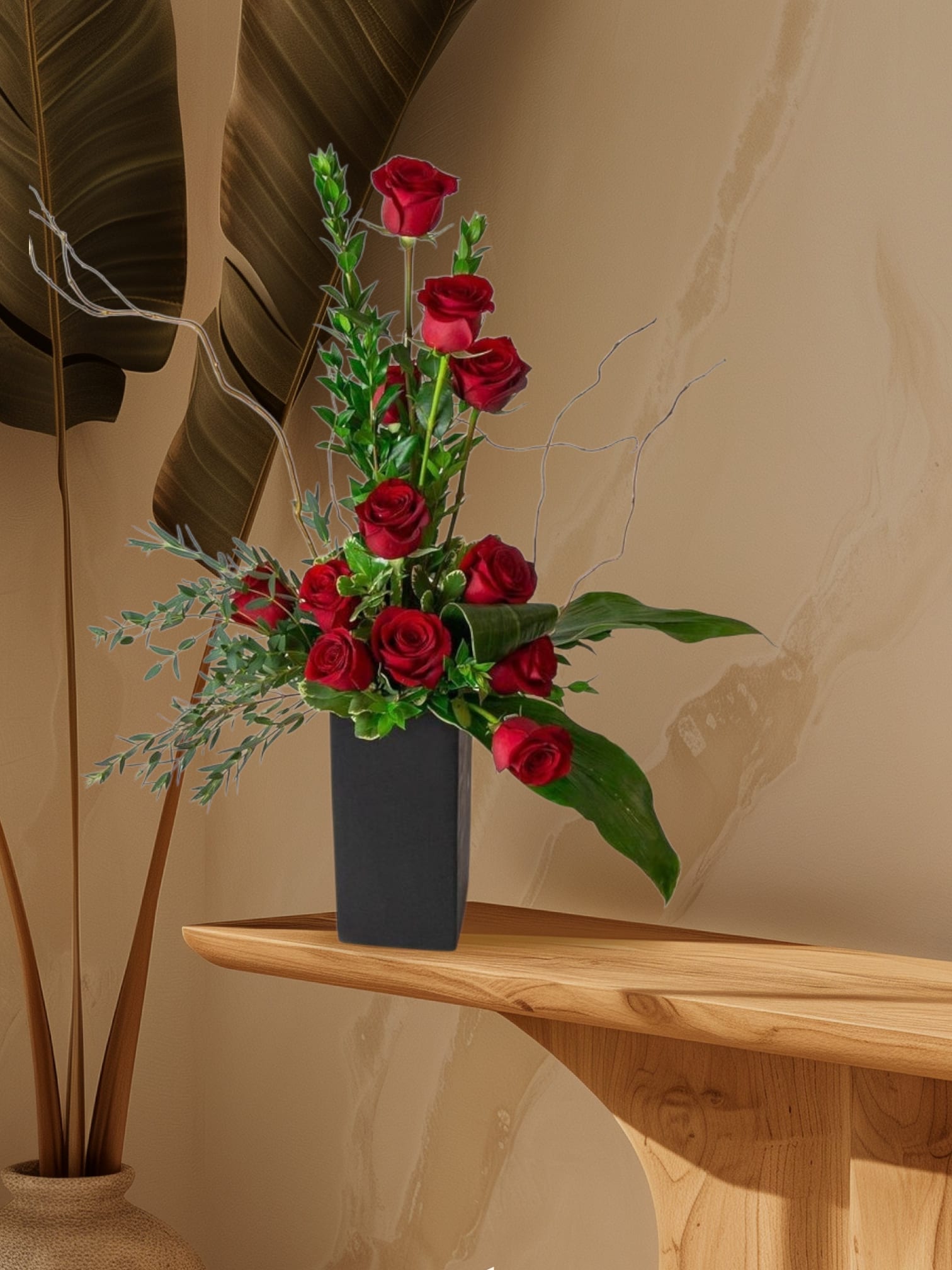 Elegant Devotion - Lush red roses paired with fresh greenery in a minimalist design that speaks timeless passion.