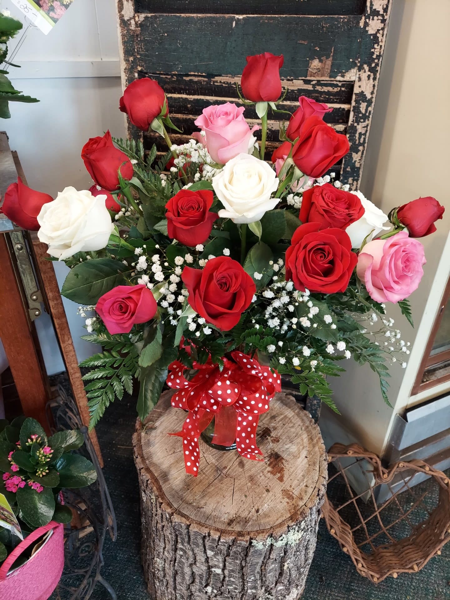 Twice the Love - Two dozen roses to send double the love this Valentine's Day.  A romantic mixture of reds, whites and pink or specify all one color.  Double the Roses; Twice the Love!