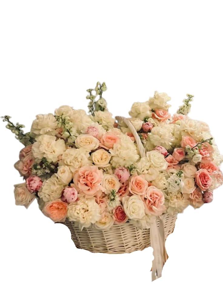 Peaches &amp; Cream Luxe Basket - An extra-large, garden-style basket overflowing with premium blooms in soft ivory, cream, and peach tones. Designed to feel airy, romantic, and seriously impressive — this is the kind of arrangement that makes people gasp when it arrives. Perfect for milestone birthdays, anniversaries, engagements, new baby celebrations, or a “go big” moment. Includes: a luxury seasonal mix (roses/spray roses + hydrangea/carnations + delicate accent blooms + premium greenery) arranged in a keepsake basket. Note: Flower varieties may vary based on availability, but we always keep the same champagne-peach color story and full, fluffy garden look.