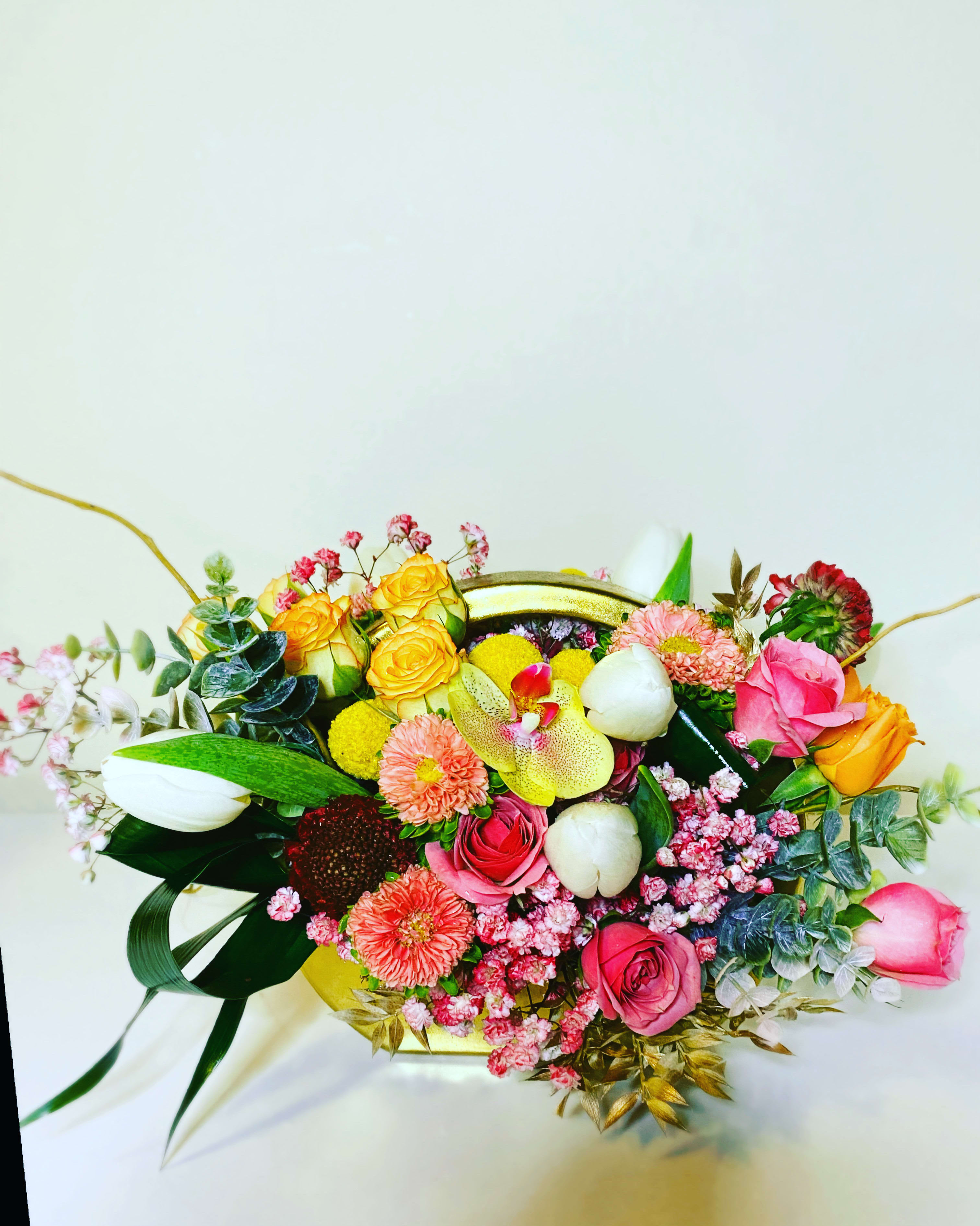 CutieBaby - Gold vase with vibrant and happy hues mixed with a touch of pastel. This comes in a gold keep sake vase. Approx size is 8x12