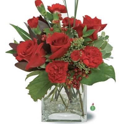 Rosey Posey - This combination that is sure to delight and surprise someone special. This combination of roses and carnations is arranged in a stylish glass cube .  
