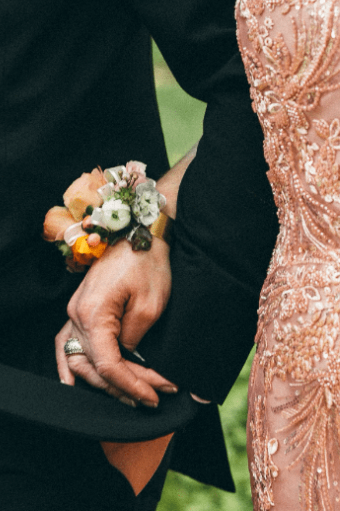 Corsages - Please call in advance for specific colors or flowers! Our corsages are arranged on either a silver or gold wristlet, please include what color you'd like. We add ribbon to match the dress to the best of our ability, please add what color the ribbon should be. Our standard flower is WHITE SPRAY ROSES (a small version of a rose). If you'd like something different please call in advance so we can accomodate for you.  919-493-1593 