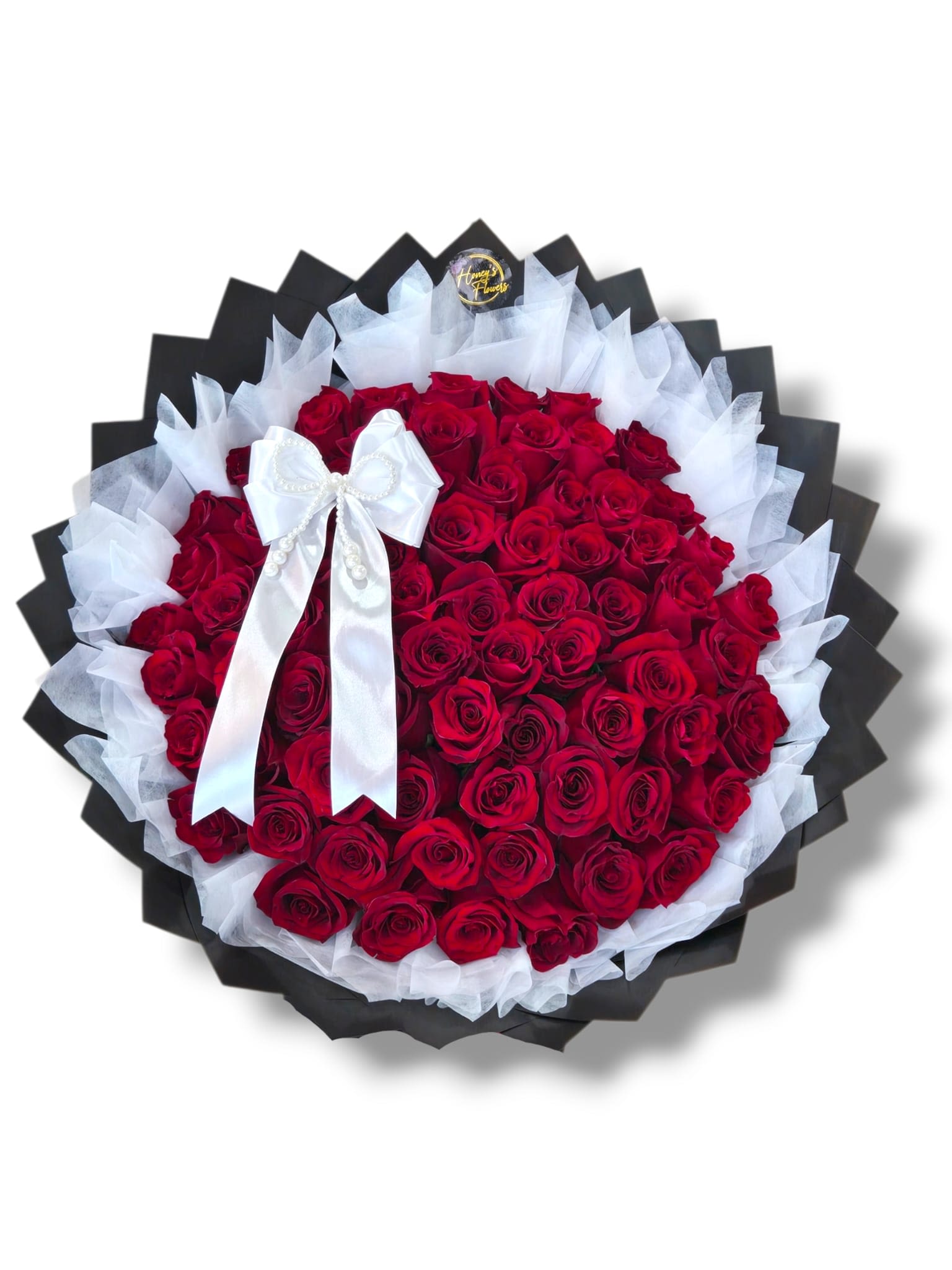 75 Red Roses Ribbon Bouquet - Agenerous and elegant bouquet showcasing 75 vibrant red roses, artfully gathered and adorned with a sleek ribbon.