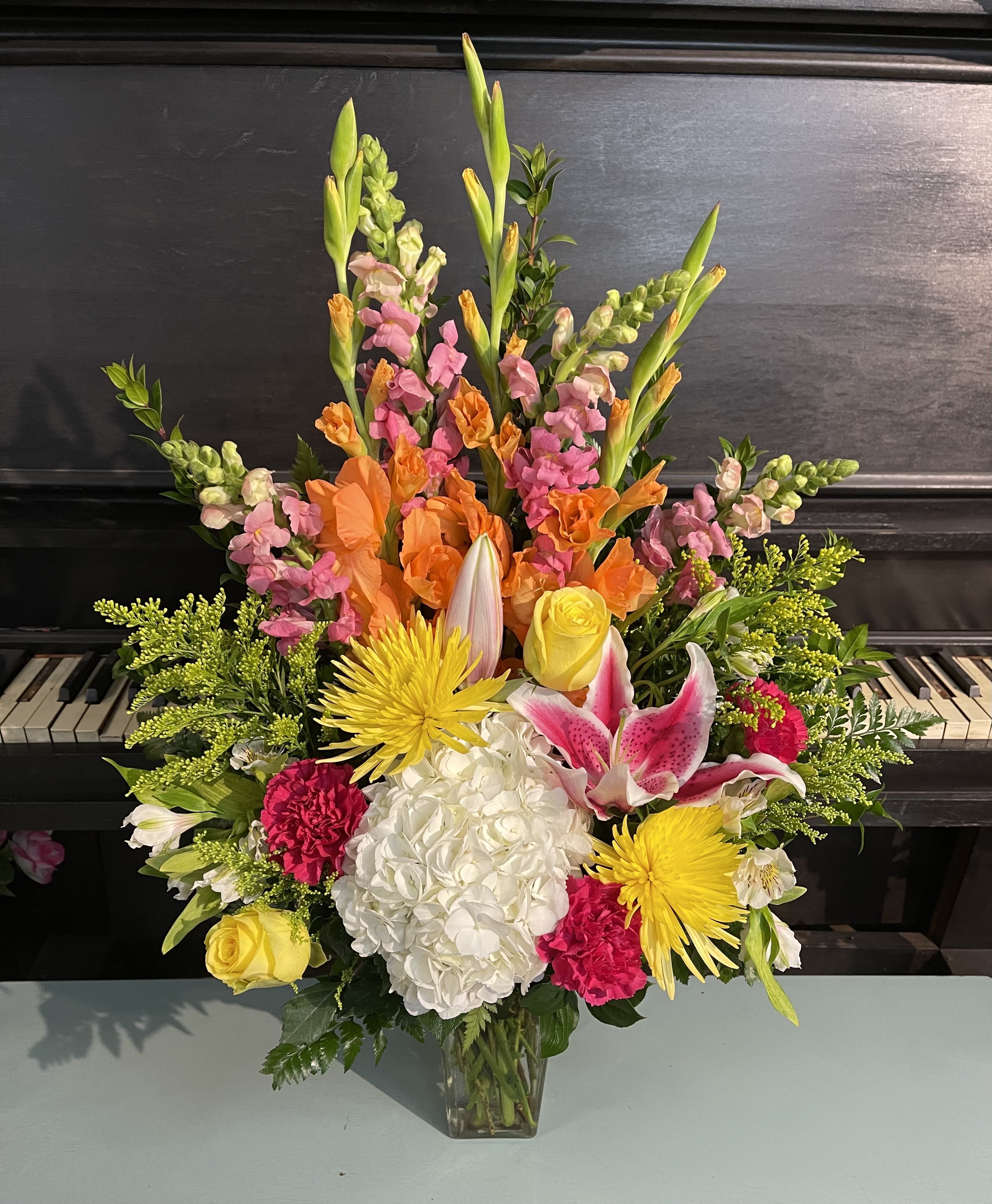 Designers Choice One Vase Mix  - Our colorful mix arrangements are DESIGNERS CHOICE. Meaning there will be no specifications flowers, no specific colors. We will guarantee a beautiful arrangement with the freshest florals. 