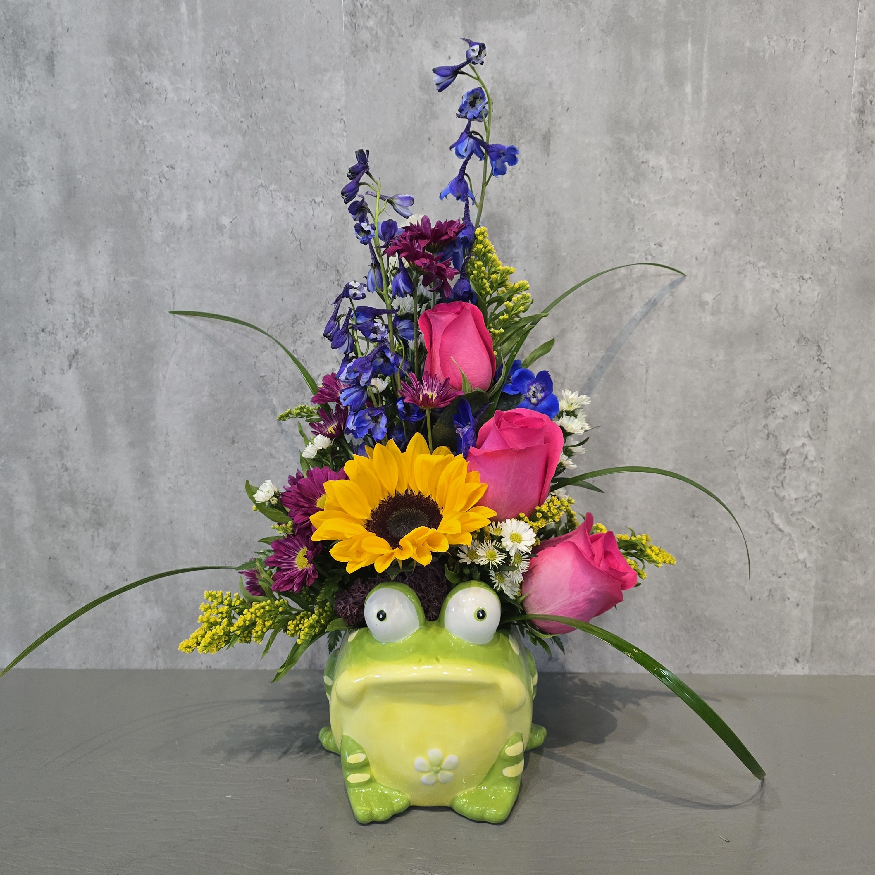 Oh Toad-ally - Hop into happiness with Oh Toad-ally, a charming flower arrangement from Flowers by Zach-Low, your local Albuquerque flower shop. Designed in an adorable ceramic toad with big, bright eyes, this delightful bouquet features fresh seasonal blooms, perfect for birthdays, get well wishes, or just because! This whimsical arrangement will bring smiles to anyone who receives it — a toad-ally unique gift they'll never forget!    Order Oh Toad-ally today from Flowers by Zach-Low, delivering fresh flowers in Albuquerque, NM to the metro area.