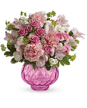 Teleflora's Simply Pink Bouquet - Give her a wink with pink! This blushing bouquet gathers beautiful blooms into a brilliant gem vase. It's a pink-tastic celebration of spring they'll enjoy today and all year long!