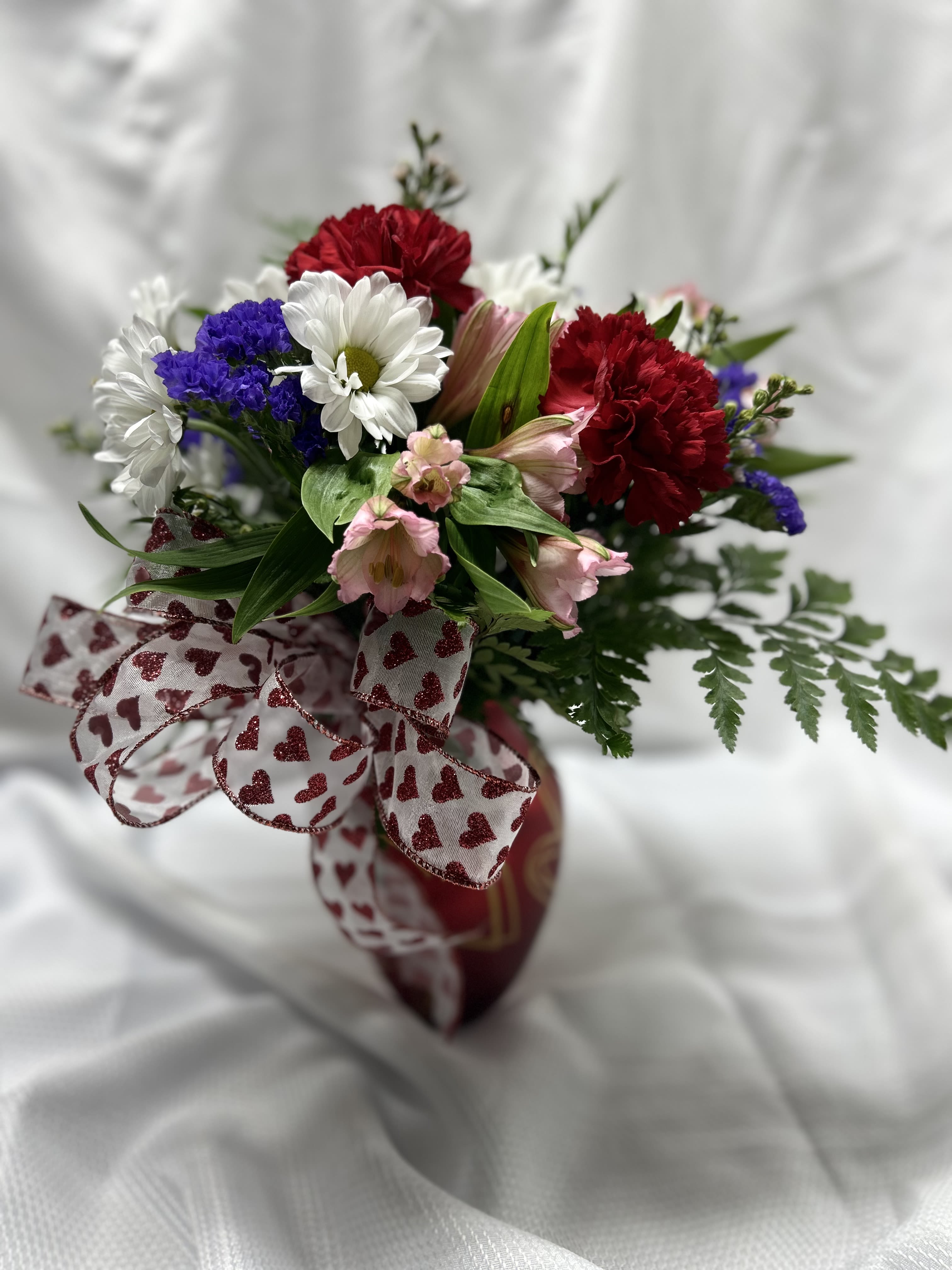 Love is Patient - Red carnations, white daisies, pink alstromeria, &amp; purple statice