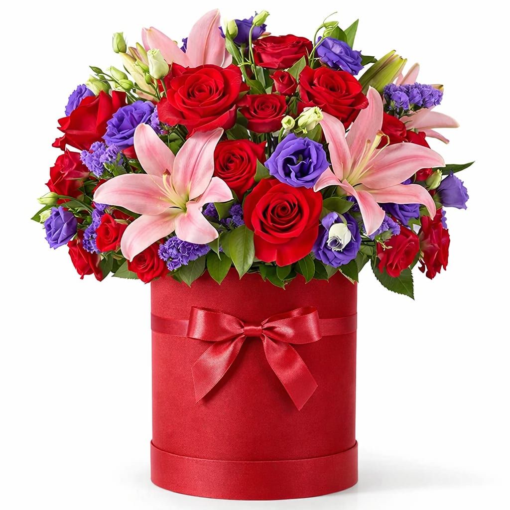 Flower Box ÂmFleur – Je t’aime à la folie - A vibrant and passionate flower box blending lush red roses, soft pink lilies, and delicate touches of purple blooms. Bold yet romantic, this arrangement captures the feeling of loving without limits — intense, joyful, and unapologetically heartfelt. Perfect for grand romantic gestures, anniversaries, or when love deserves to be celebrated à la folie.
