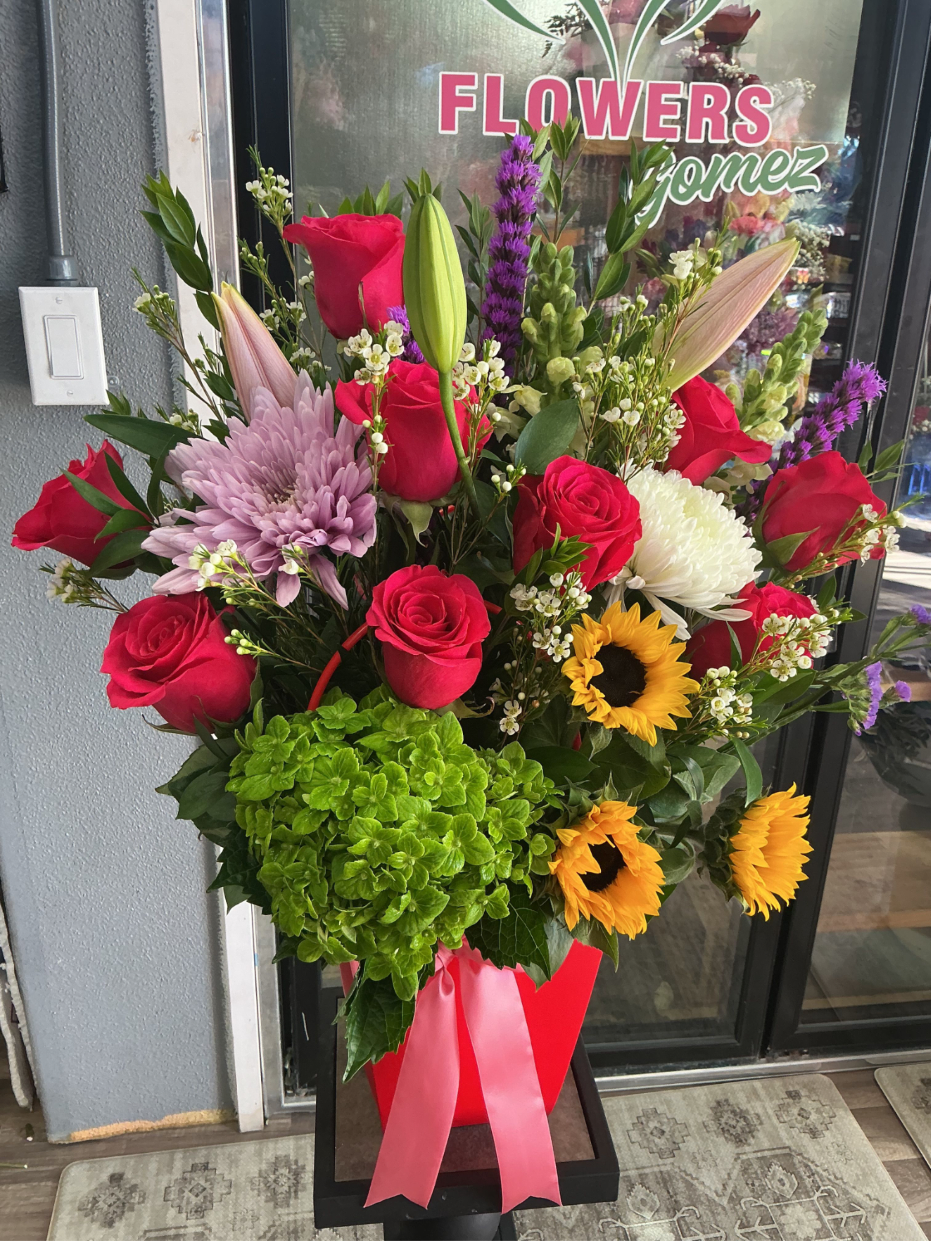 Passion vibes  - A great selection of flower for a lovely day ,sunflowers ,roses, pink carnations,lilies and much more 