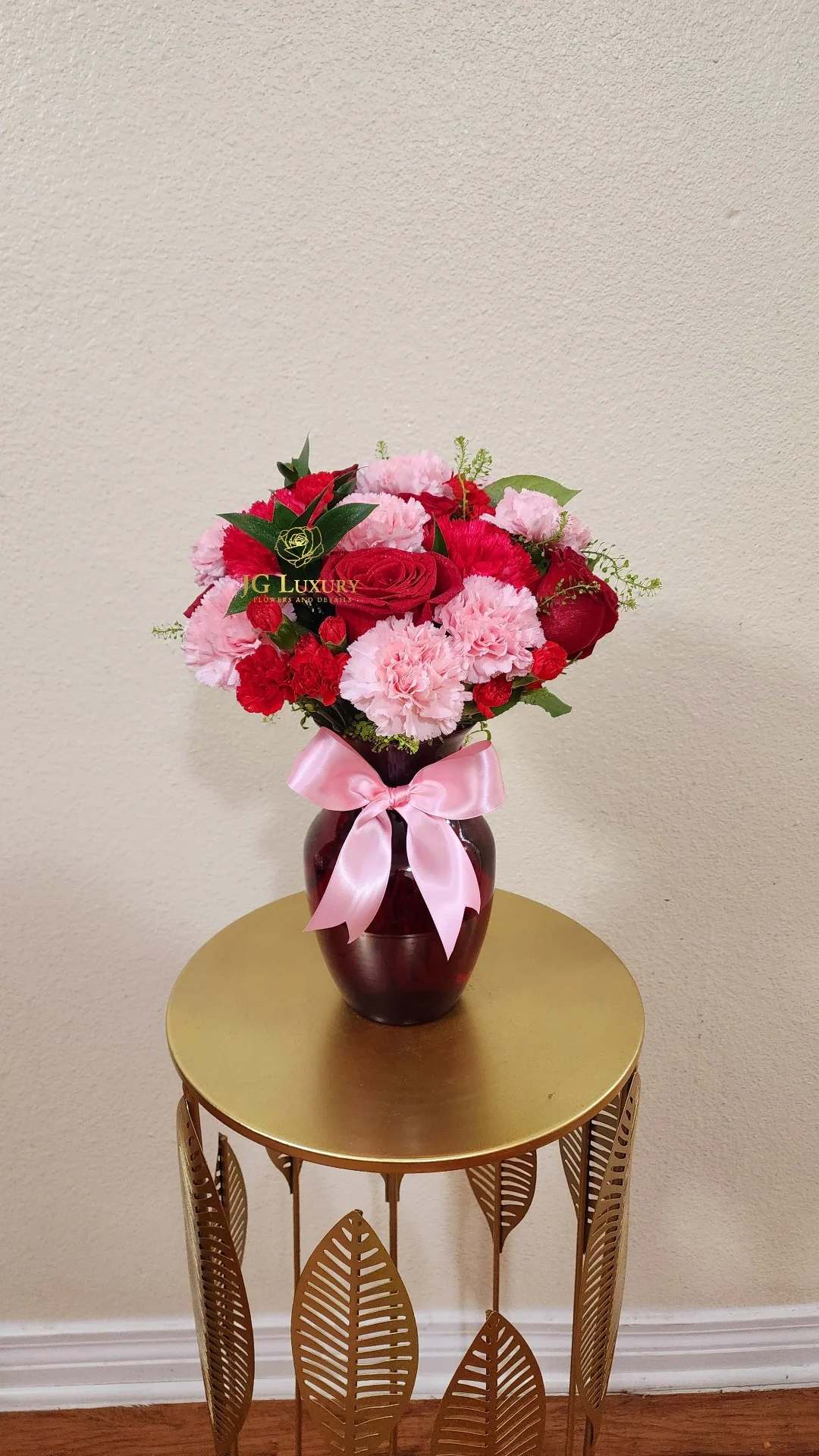 Truly Yours  - Carnations, roses, greens, rucus and mini carnations means a mix of blooms that will make you fall in love for this beautiful arrangement made with tons of love.