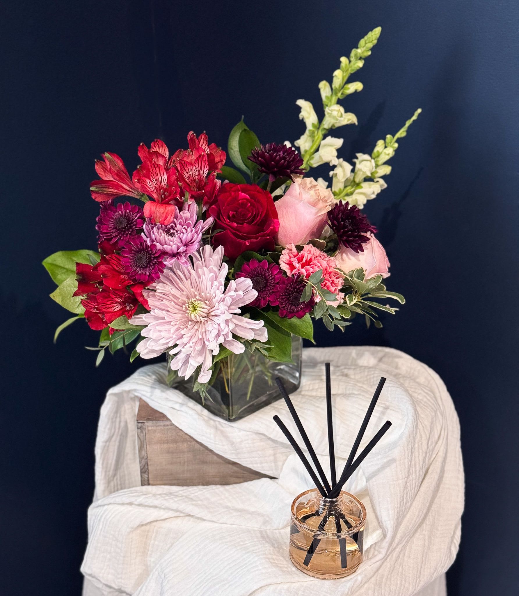 Calm &amp; Comfort Diffuser Gift Set - A thoughtful gift designed to bring a sense of calm, warmth, and ease into any space. The Calm &amp; Comfort Diffuser Gift Set is perfect for moments when flowers alone aren’t quite right, or when you want to pair something lasting with a meaningful gesture.  This curated set features a beautifully scented diffuser chosen for its soft, welcoming fragrance that gently fills a room without being overpowering or safety issues with little ones running around. Ideal for thank you gifts, sympathy gestures, housewarmings, teacher appreciation, or everyday self-care, this gift offers comfort in a quiet, intentional way.  Thoughtfully selected by The Artisan Fox, a boutique florist and gift studio in Ada, Michigan, this diffuser gift set is designed to feel personal, polished, and easy to give.  A simple way to say thinking of you, thank you, or take a moment to breathe  *Please note that our floral and color palette changes from week to week. All substitutions are equal in value.