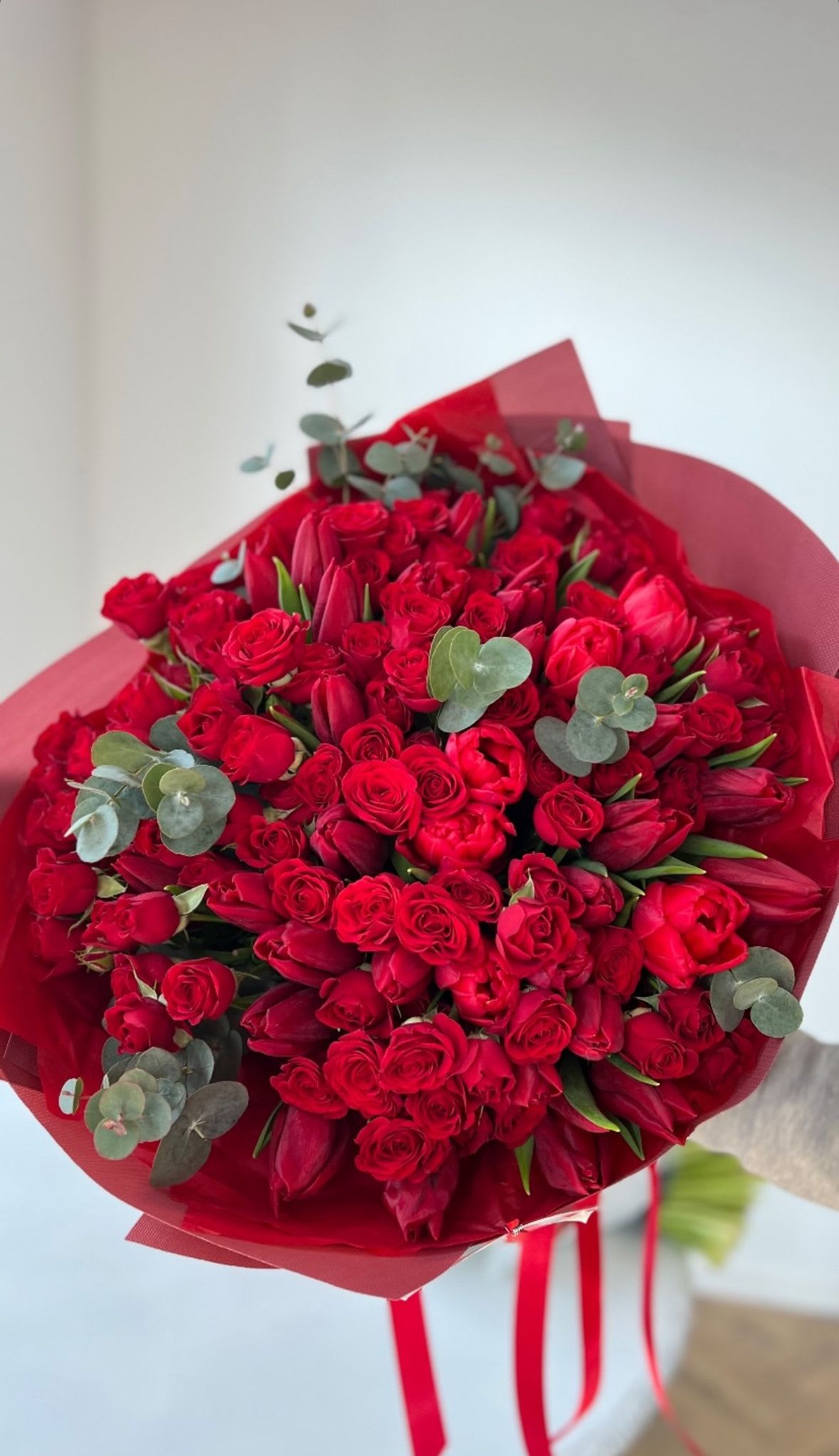 bouquet of red spray roses and red tulips - bouquet of red spray roses and red tulips