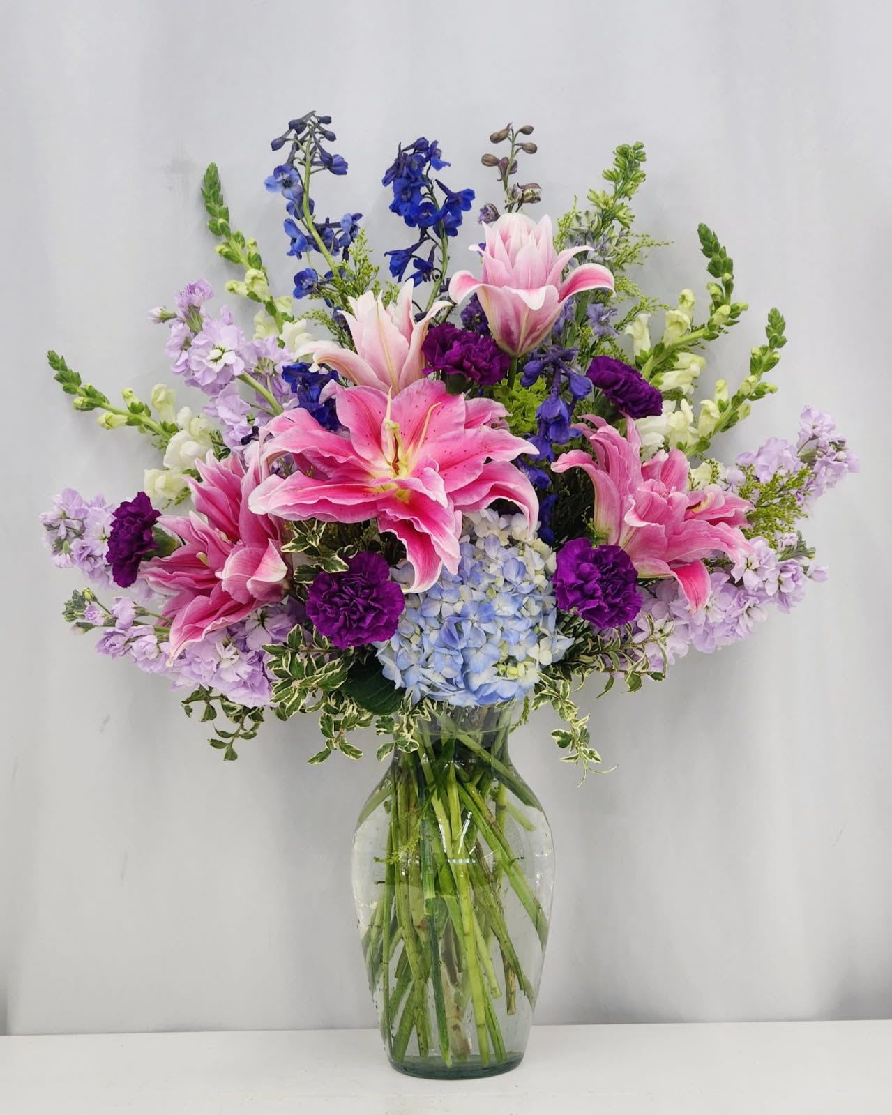 Fanciful - Elevate your space with Fanciful, a beautifully crafted arrangement designed to bring elegance and charm to any setting. Its refined composition exudes sophistication while creating a warm, welcoming atmosphere. Perfect for special occasions. Fanciful offers timeless beauty that supports your desire for grace and style. ONE SIZE ONLY