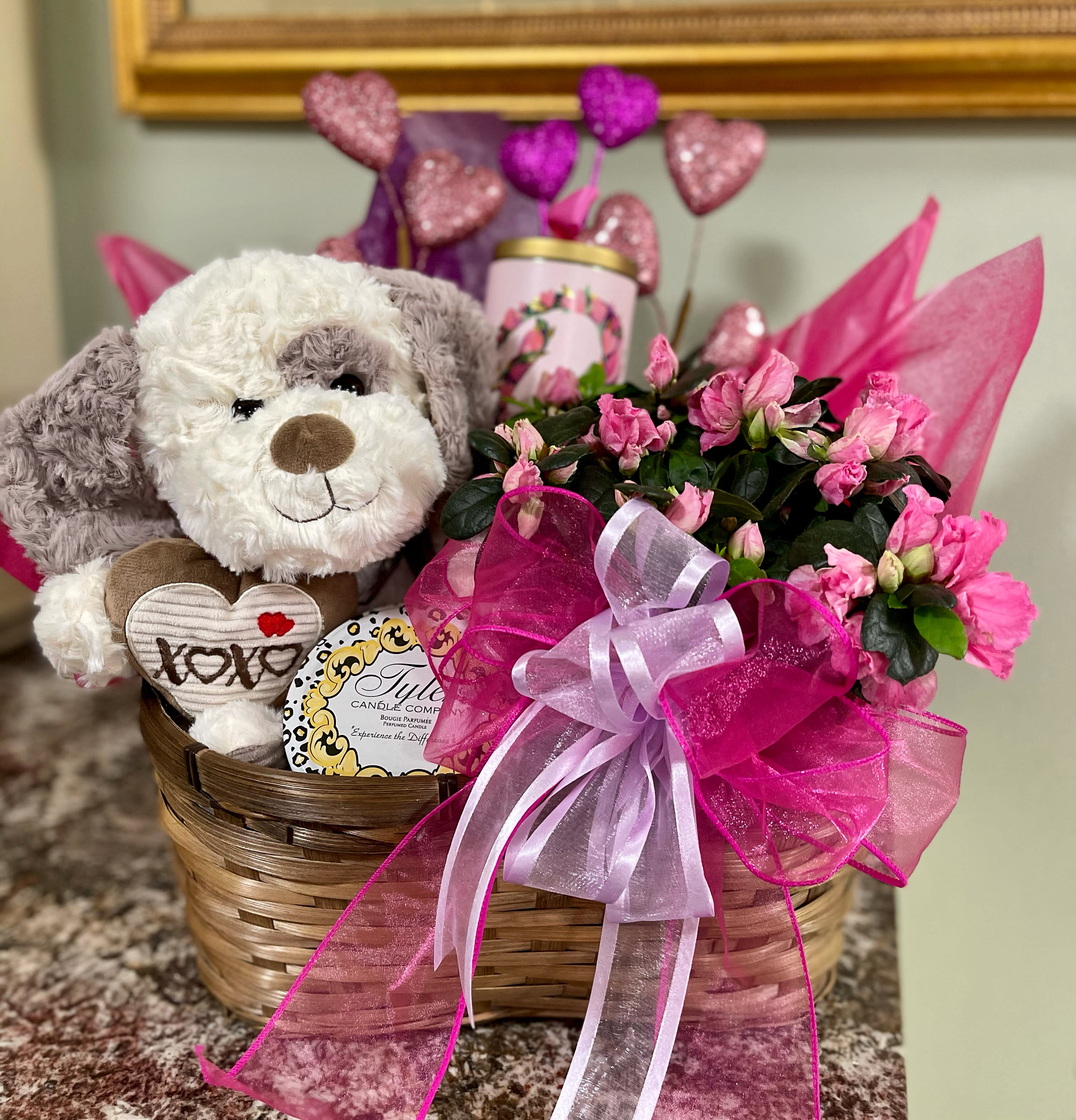 The Legacy Puppy Love Bundle - Our Puppy Love Bundle is the perfect gift for your Galentine, Valentine or any time you need to share some love to the puppy lover in your life.  This bundle includes an adorable plush puppy, a medium Tyler Candle, Plum Island Hand Butter, gourmet chocolates, a blooming plant and more.