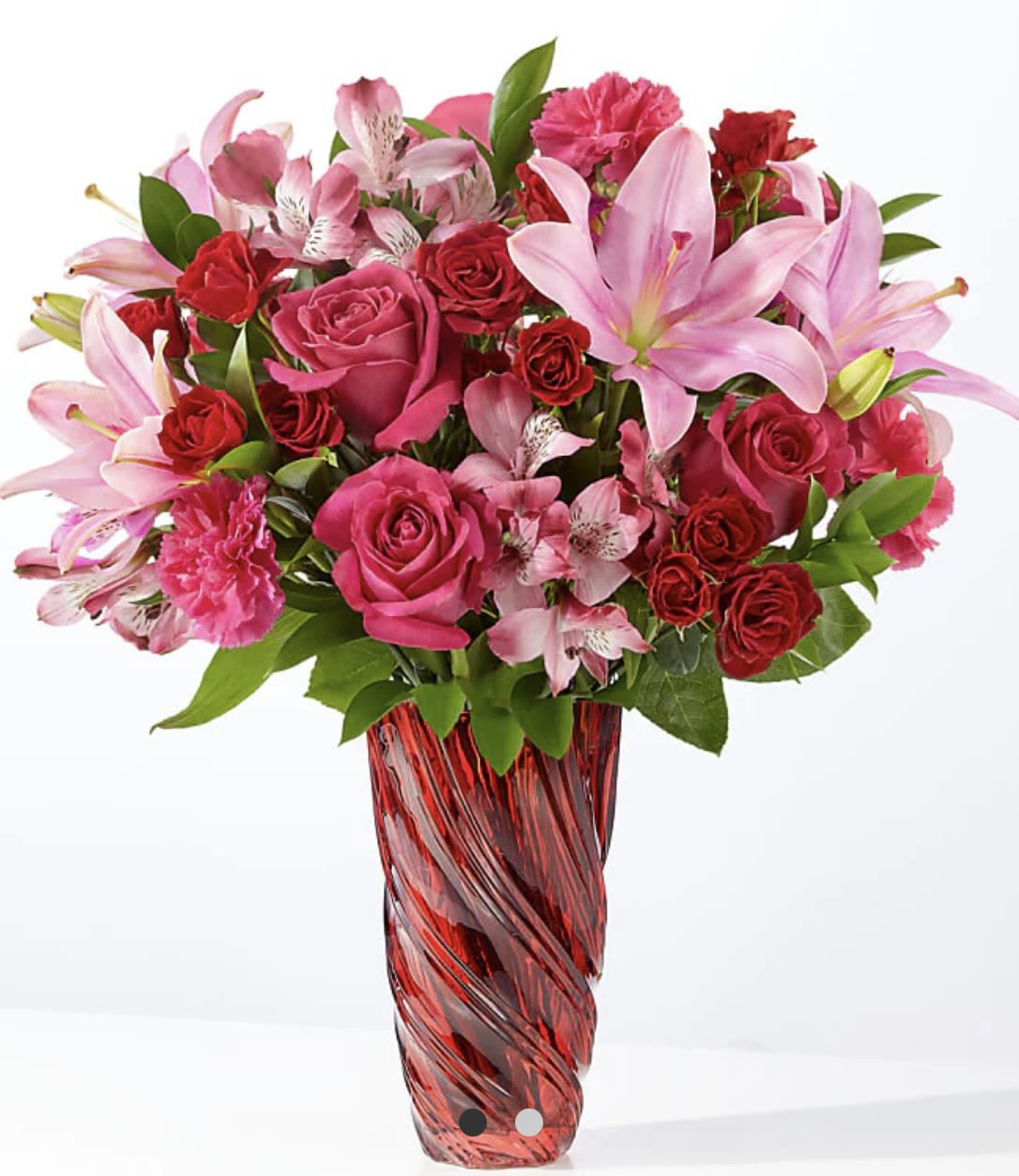 Berry in Love - No matter the occasion or the recipient, they deserve our berry best bouquet. This lush arrangement features hot pink roses, carnations and alstroemeria to color their day.