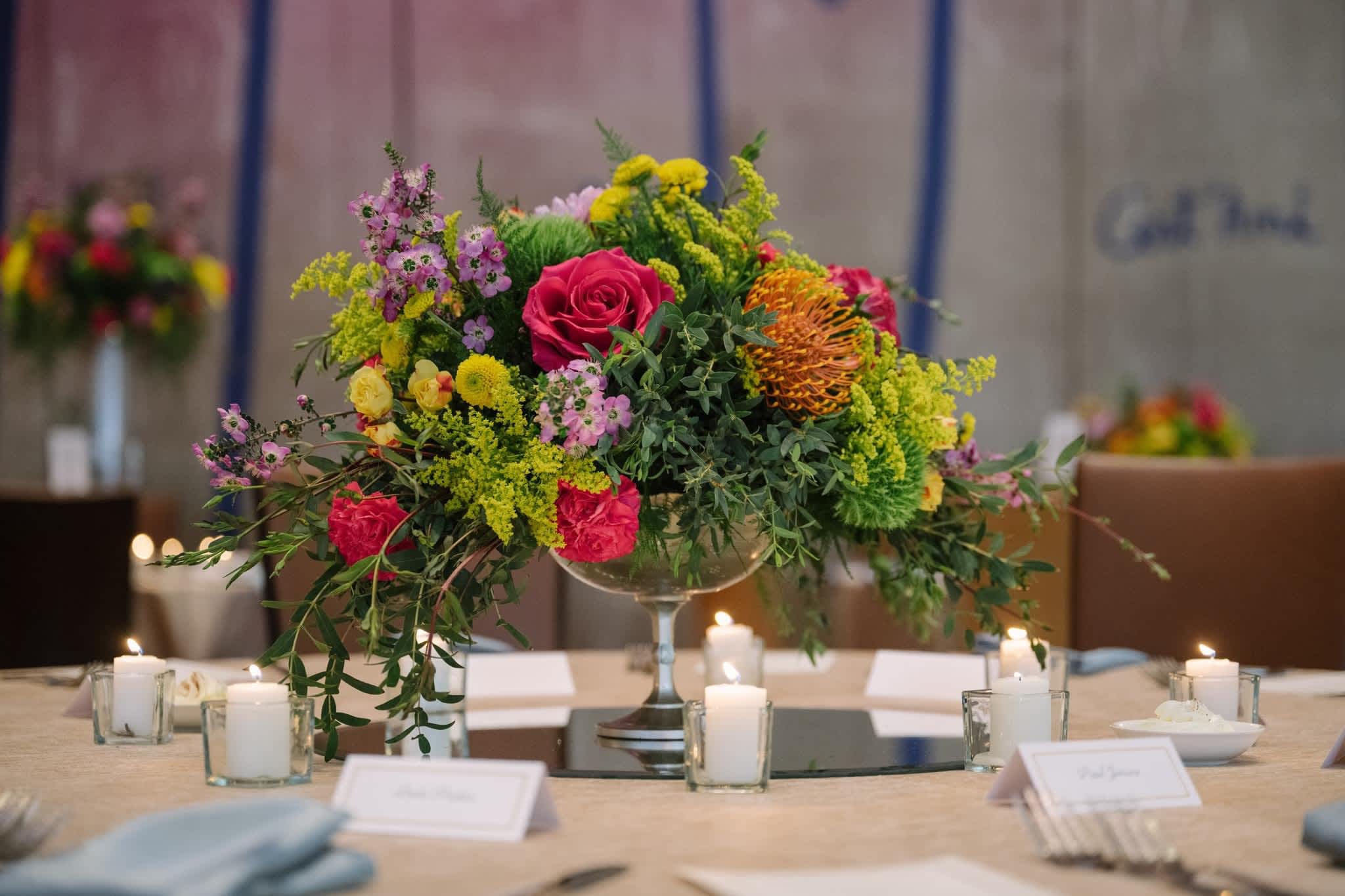 Secret Garden  - A striking blend of vibrant floral and lush greenery.