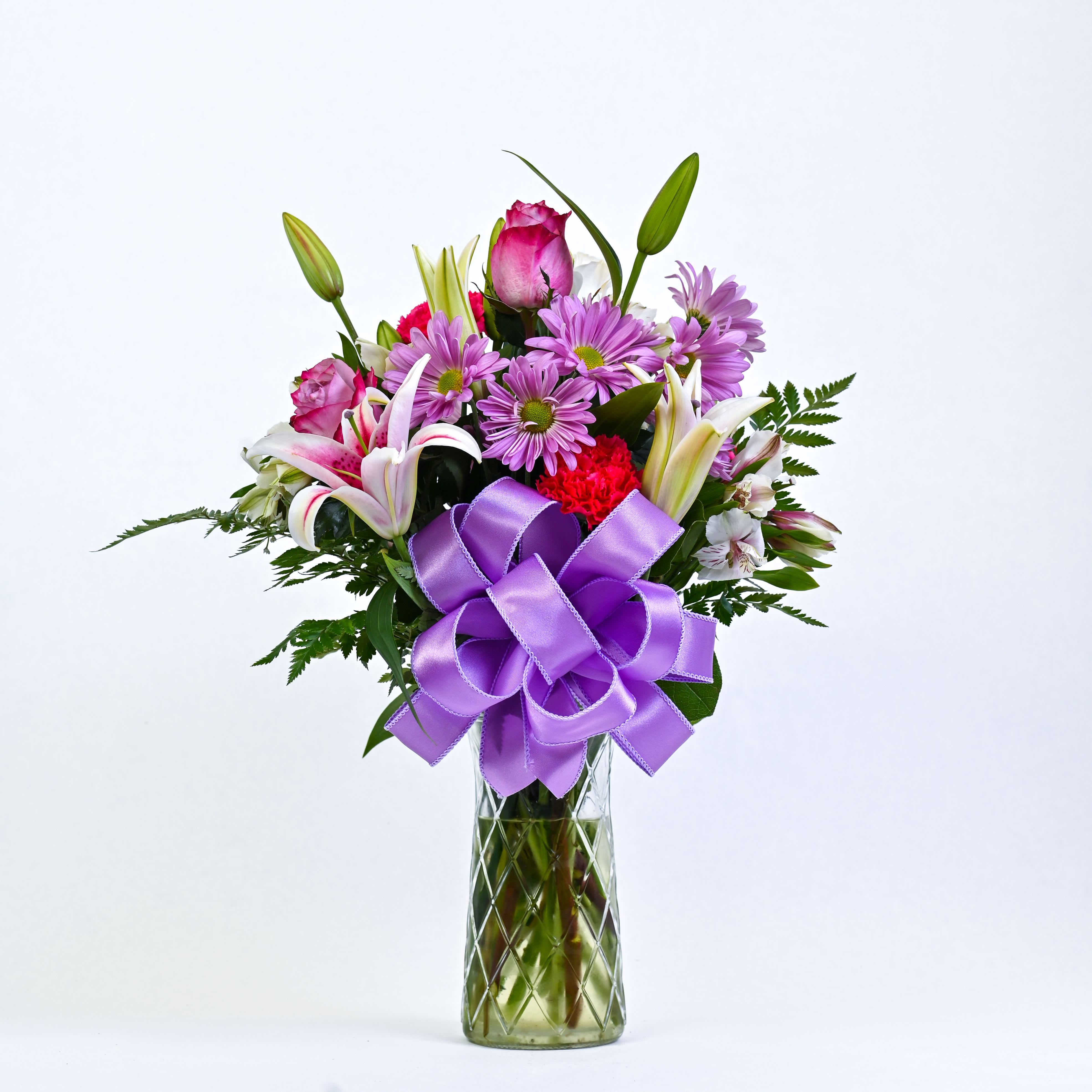 Delightful Blooms Bouquet - More than just delighted, they will be absolutely beside themselves with joy when you give them this gorgeous arrangement of stargazer lilies, roses, daisies, alstroemeria and carnations in an elegant gathering vase.