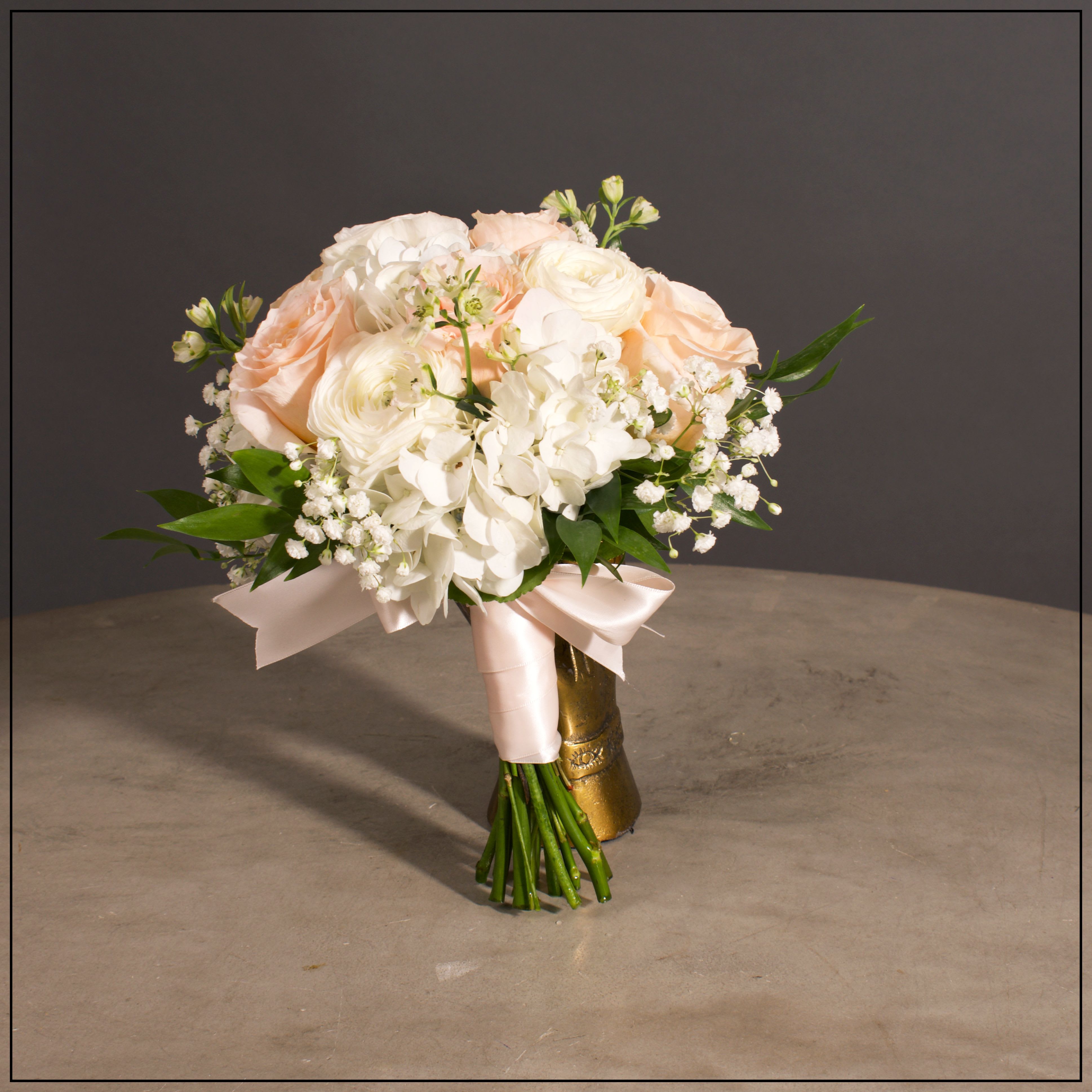 The Dance - please see description - A small handheld Bouquet to replace a corsage.  Hydrangea, Roses, Ranunculus, Delphinium and Baby's breath tied with a satin ribbon. DOES NOT COME IN A VASE, IT'S WRAPPED.