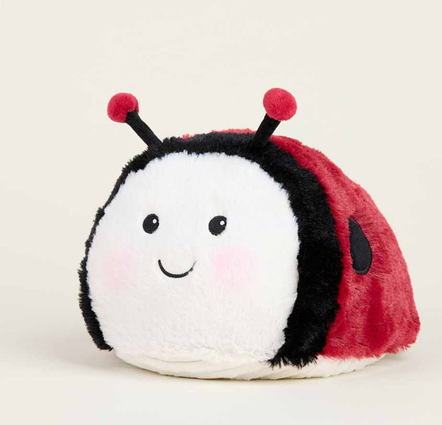 Ladybug Warmie  - Warmies® Plush are fully microwavable to provide hours of soothing warmth and comfort. Plush Ladybug Warmies is scented with real dried French lavender and perfectly weighted for a positive sensory experience. Warmies make an ideal gift for all ages.  Quick Facts:  Simply Warm Weighted Ladybug Warmies in a Microwave Soothes, Warms and Comforts Plush Scented with Real French Lavender Chill in a Freezer for Cooling Relief Safe for all Ages Dimensions: 8"x9"x6.5" Weight: 2lbs