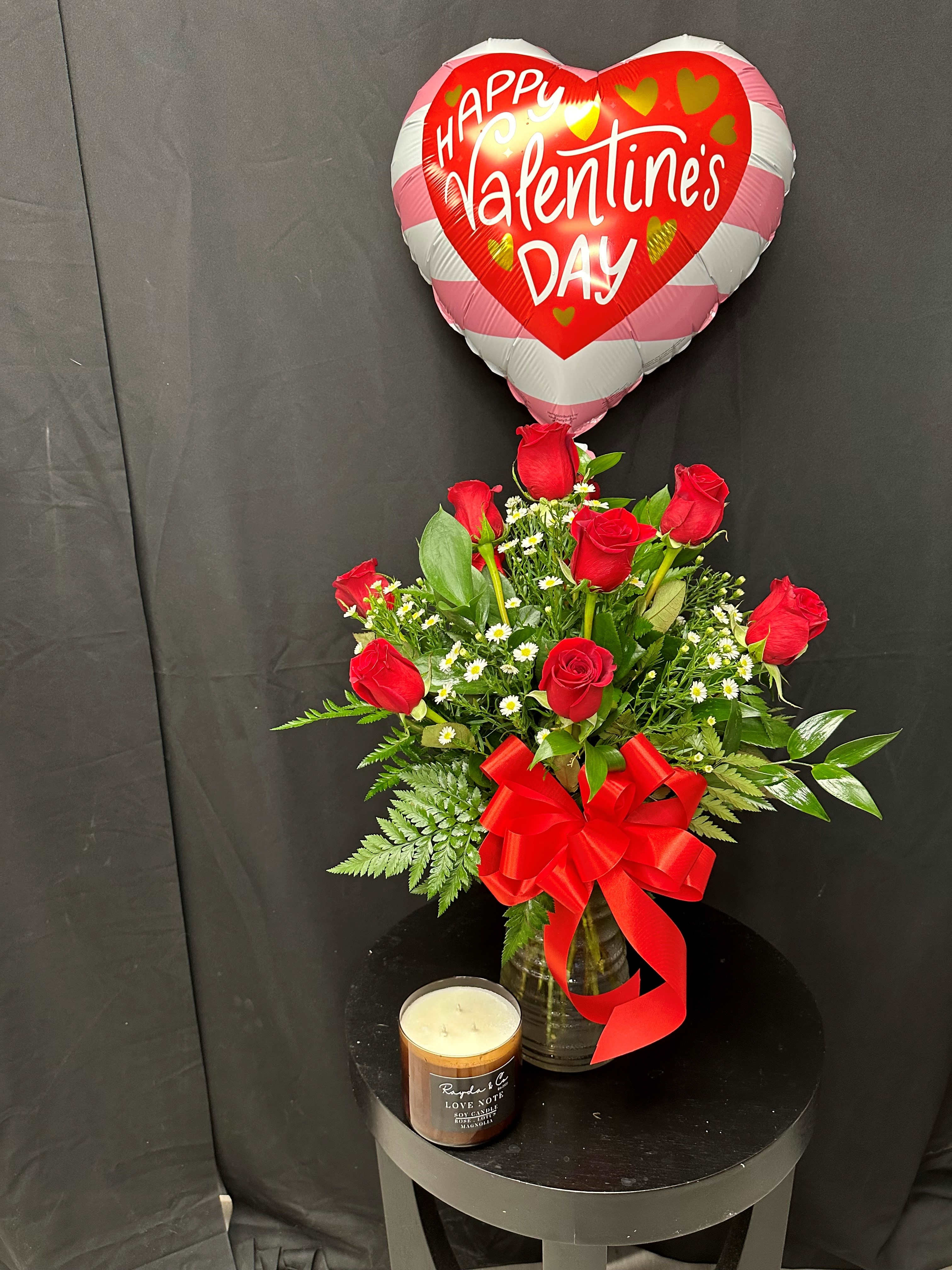 Valentine's Day Candle Bundle - Give your Valentine a great surprise with this one of a kind bundle of a Dozen Red Roses, Hand Made Soy Candle, and a Valentine's Balloon.  Deluxe Includes Delicious Chocolates and 10" Bear Premium Includes Delicious Chocolates and 14" Bear