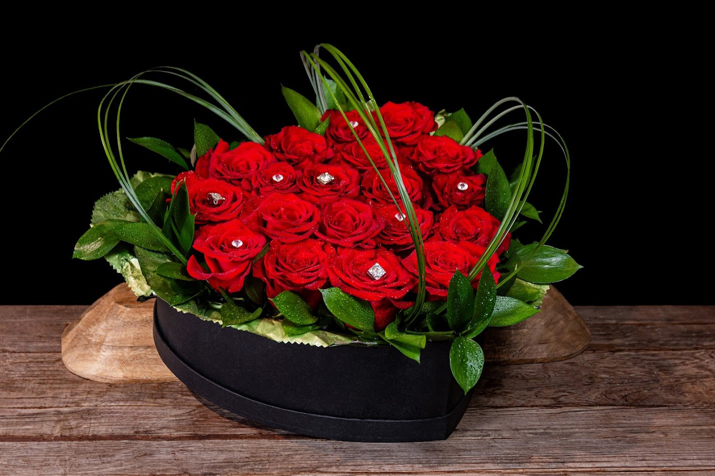 Tiffany - 18 red roses adorned with diamonds and assorted greens in a luxury hatbox