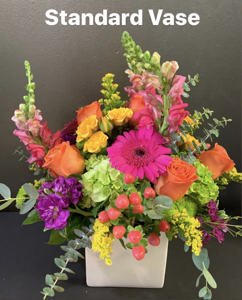 Va Va Bloom  - Turn up the heat with the vivacious bouquet. This arrangement includes roses, snapdragons and hydrangea, among others. This is the perfect gift for someone's birthday or any celebratory occasion. Not available during the Valentine's season.