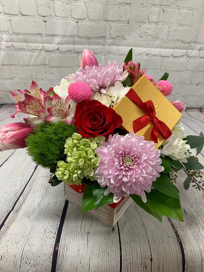 My Valentine - This beautiful Valentines Mix will sweeten someone's special day!  Godiva Chocolate 4 piece Gold Favor is included.  Hydrangea, Red Roses, Mums, Tulips etc.