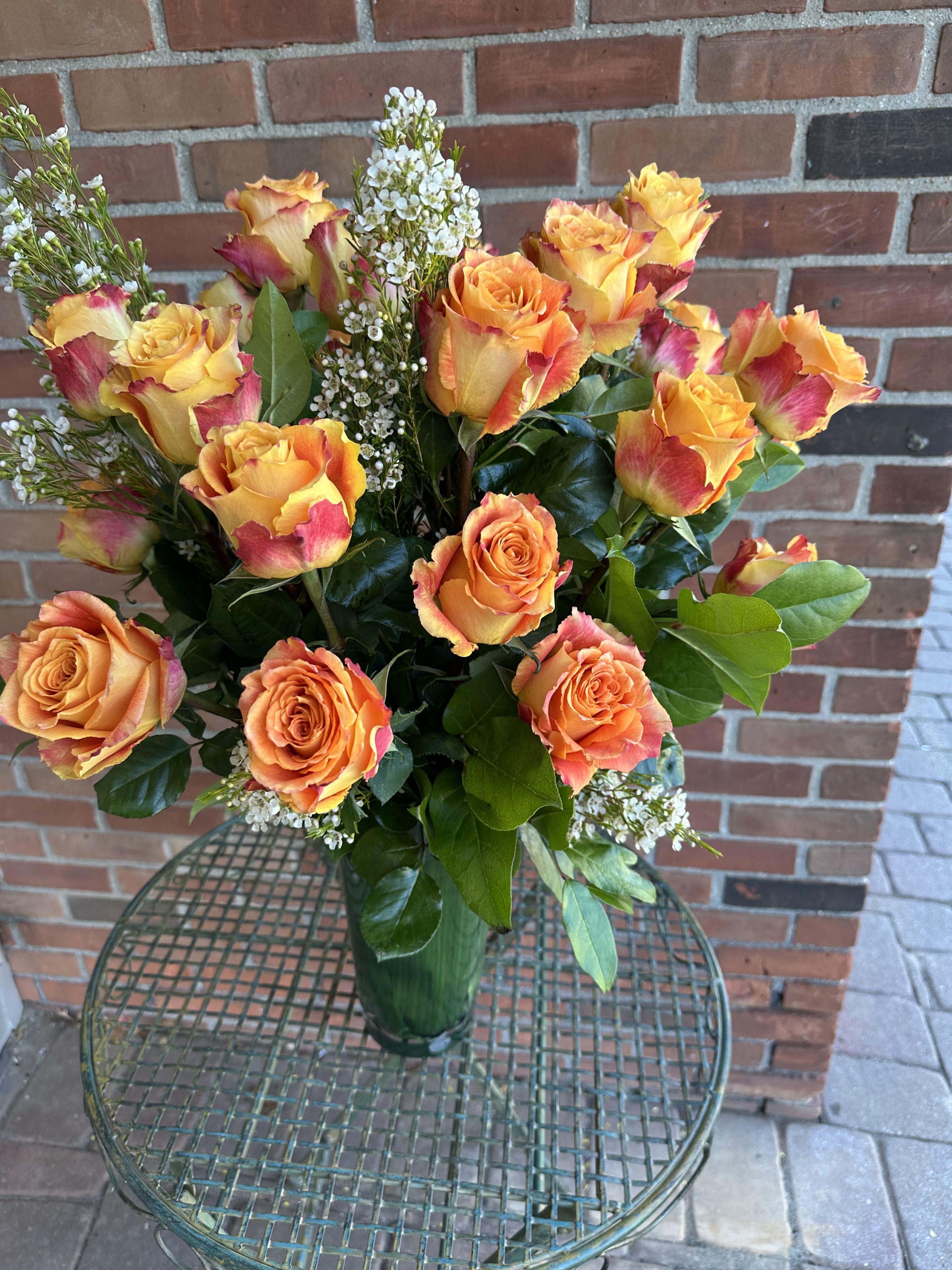 ORANGE ROSES PREMIUM  - Deluxe orange roses in beautiful vases  **Standard version** Dozen Long-stemmed roses  **Deluxe version** 24 Long stemmed roses   **Premium Version** 36 Long stemmed roses 